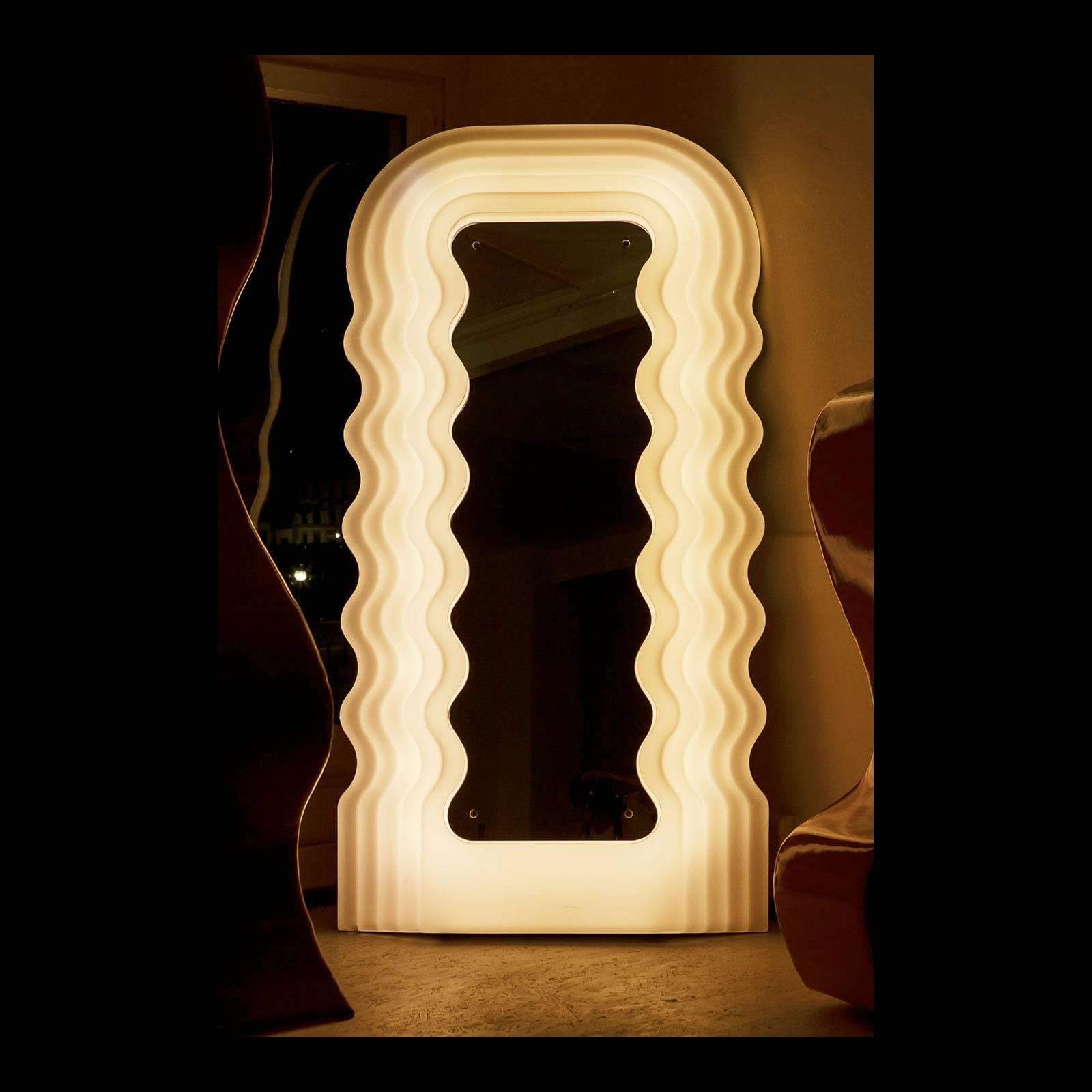 1970s Mid-Century Modern mirror wall Ultrafragola by Ettore Sottsass
Measures cm: H 195, W 100, D 13

The original piece was produced in the 1970s by Poltronova and the acrylic sheet with which it was produced has assumed a slight yellowish