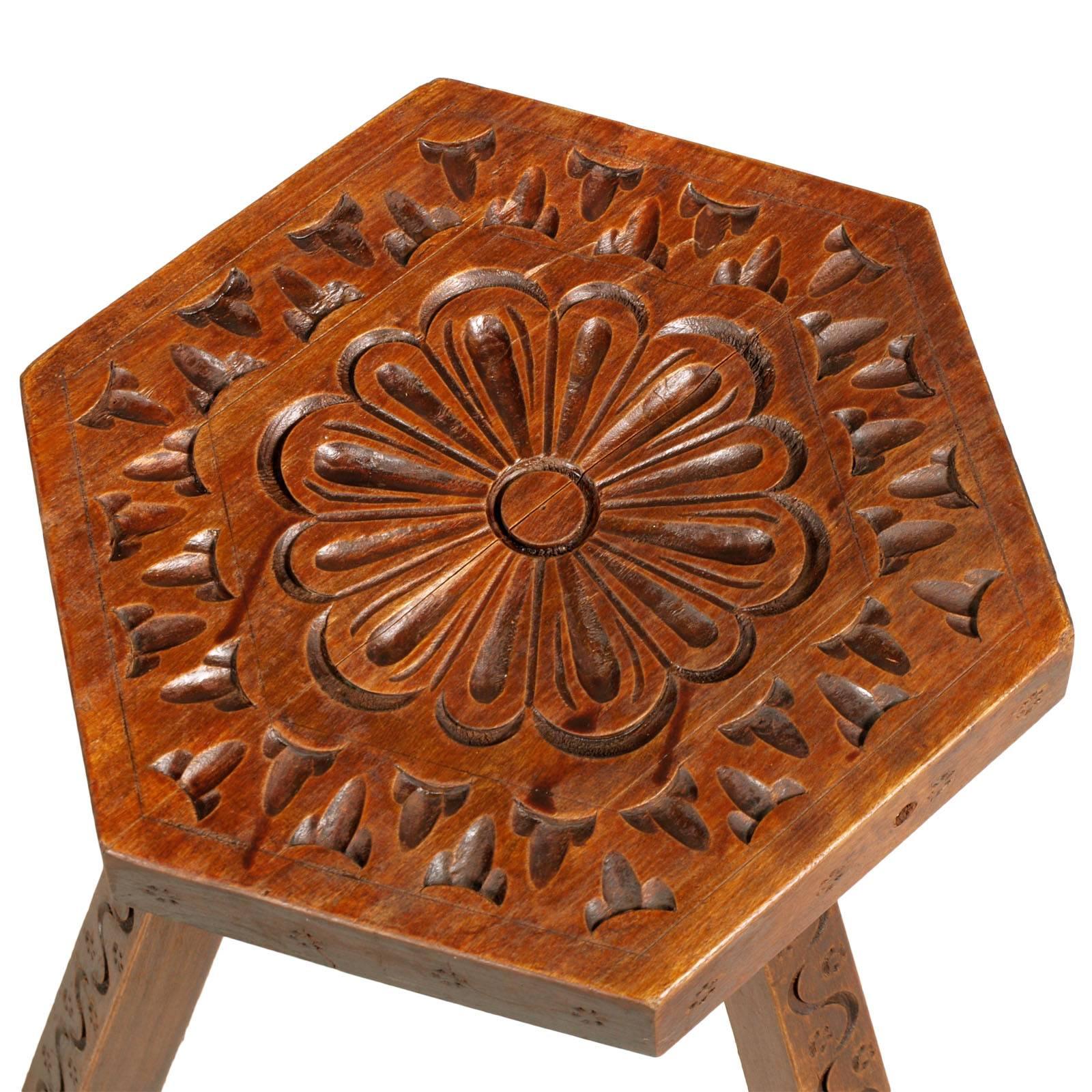 1927  Italian hexagonal country stool, signed 1927 Cortina, richly carved chestnut wood, polished to wax.

Measures cm: Height 44, diameter 31.