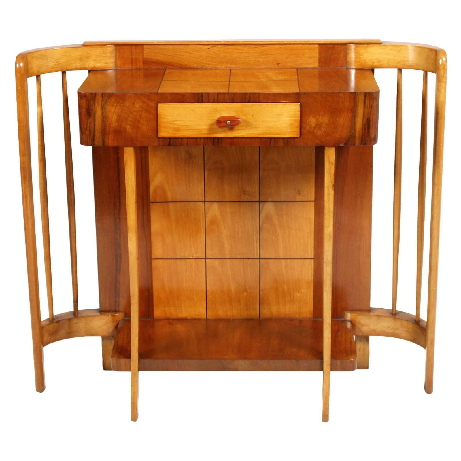Mid-20th century Art Deco console with mirror Paolo Buffa style, by La Permanente Mobili Cantù, in walnut and massive maple ; polished to wax.
We can sell separately

Measures cm: Console H84 W96 D30 (mirror H56 W41 D4).