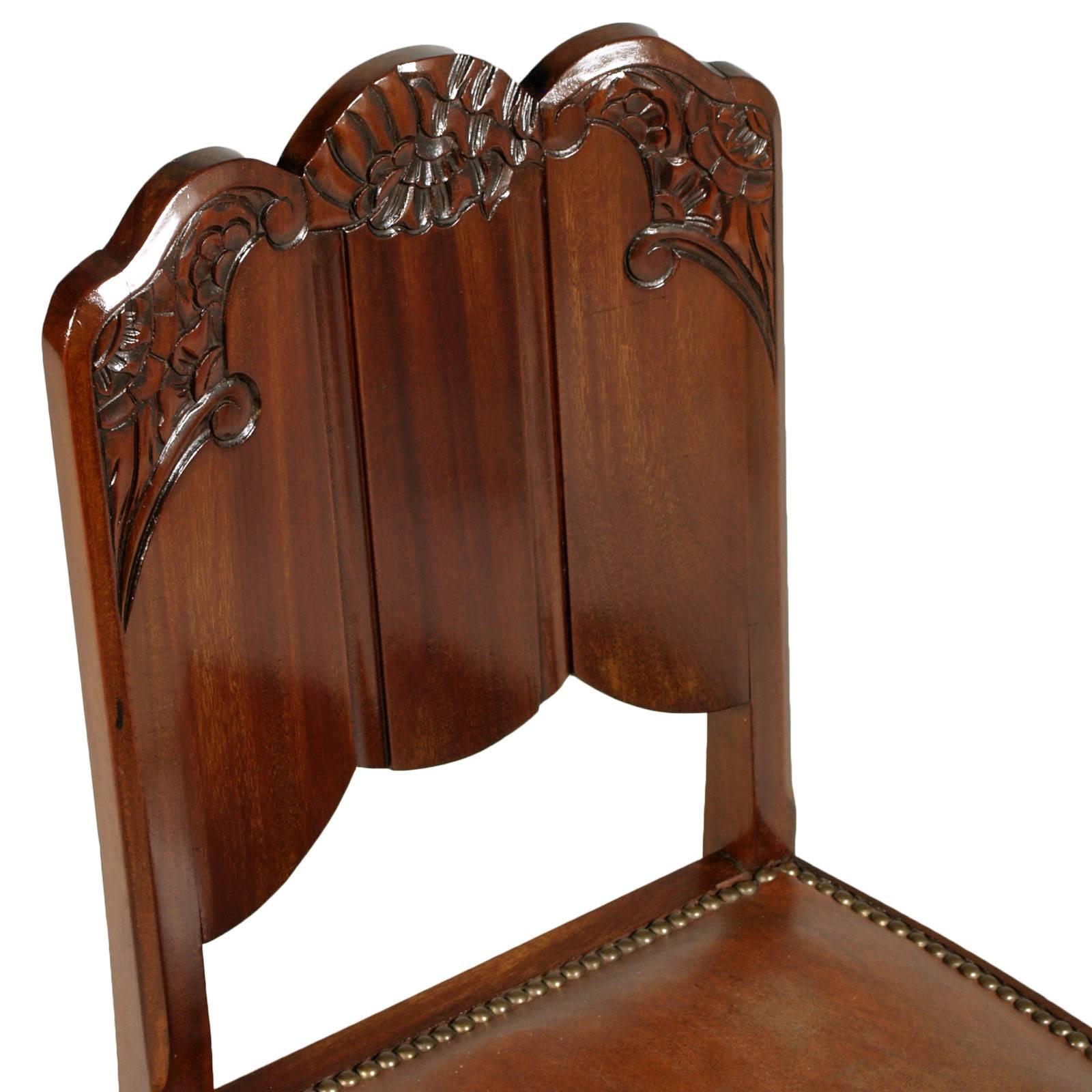 Early 20th century French Art Nouveau carved mahogany chair with leatherette tobacco color seat with springs. Restored and polished to wax.
Precious chair also for a modern desk.
Printed under 