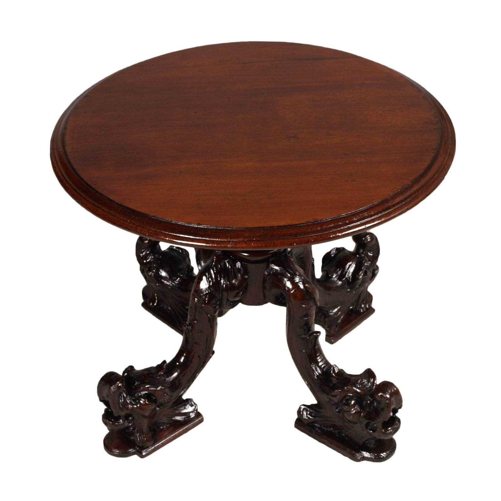Mid-19th century hand-carved oakwood Gothic revivalist coffee table Eugène Emmanuel Viollet-le-Duc style. Top in blond applied oakwood slab. 
Table from ancient Palladian mansion, Vicenza

Measures cm: H 50, diameter 62

About
Eugène Emmanuel