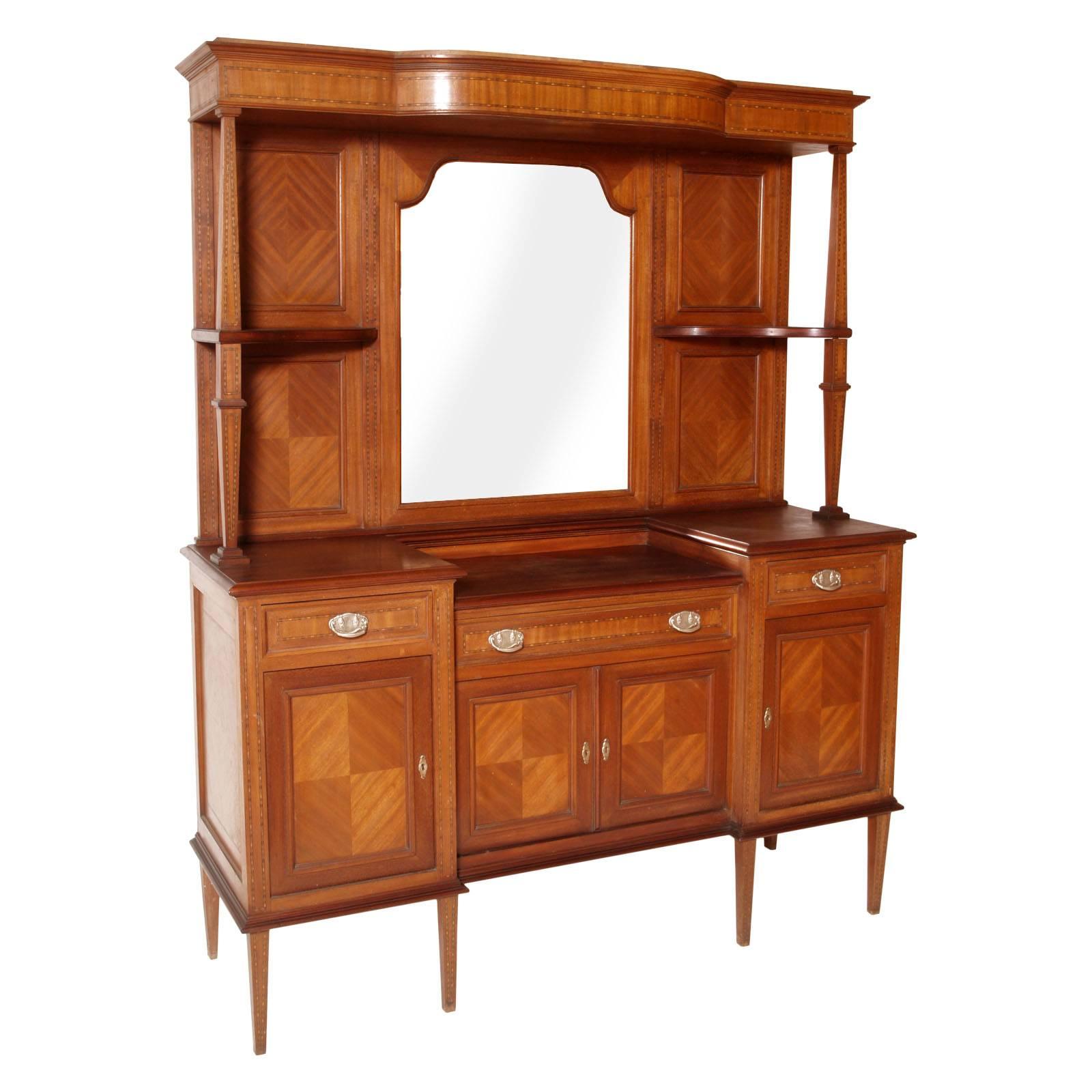 Italy Credenza sideboard eclectic period belle epoque, in walnut, mahogany and maple inlay, circa 1910. Restored and polished to wax. Excellent conditions.
Measure cm: H 205, W 170, D 54.

Ancient Ecleptic credenza, of the early '900, in walnut,