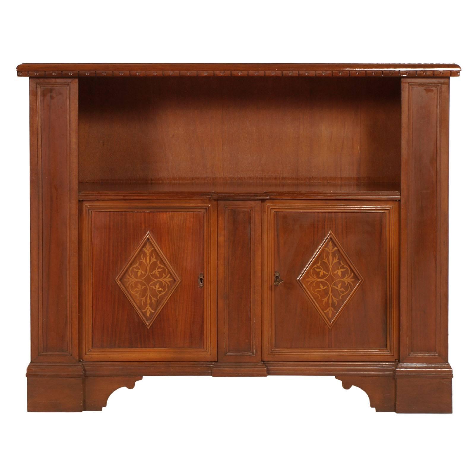 1940s entrance Italy cabinet, Renaissance style, by Bassano's Ebanistery in blond walnut , wax finished
Measure cm:  H 96   W 118   D 36 