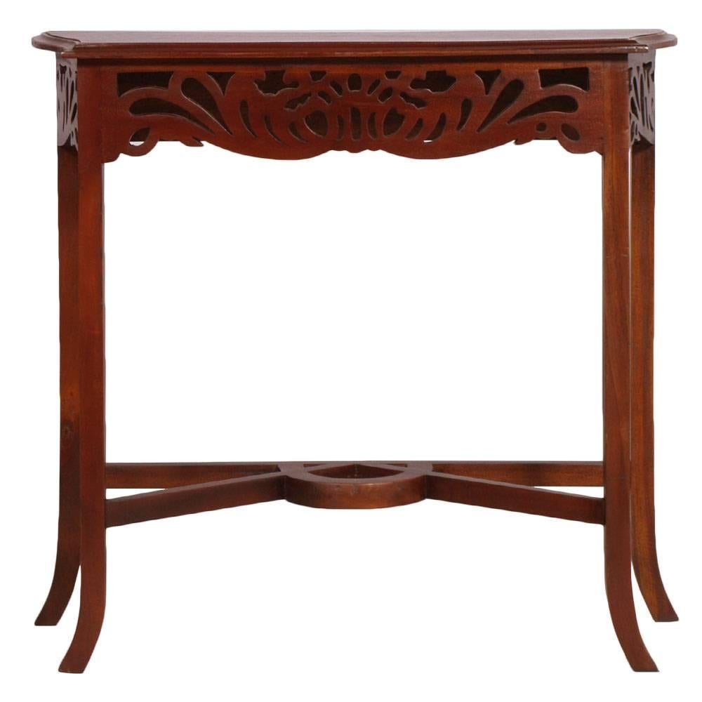 Eugenio Quarti Style
1910s Art Nouveau Belle Époque console in carved walnut polished to wax.
The style of this console is Eugenio Quarti (1867-1929) - Italian furniture and cabinet maker in the Stile Liberty (Art Nouveau Style). Quarti Worked