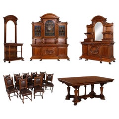 Exceptional monumental Italian Renaissance dining room suite in carved walnut