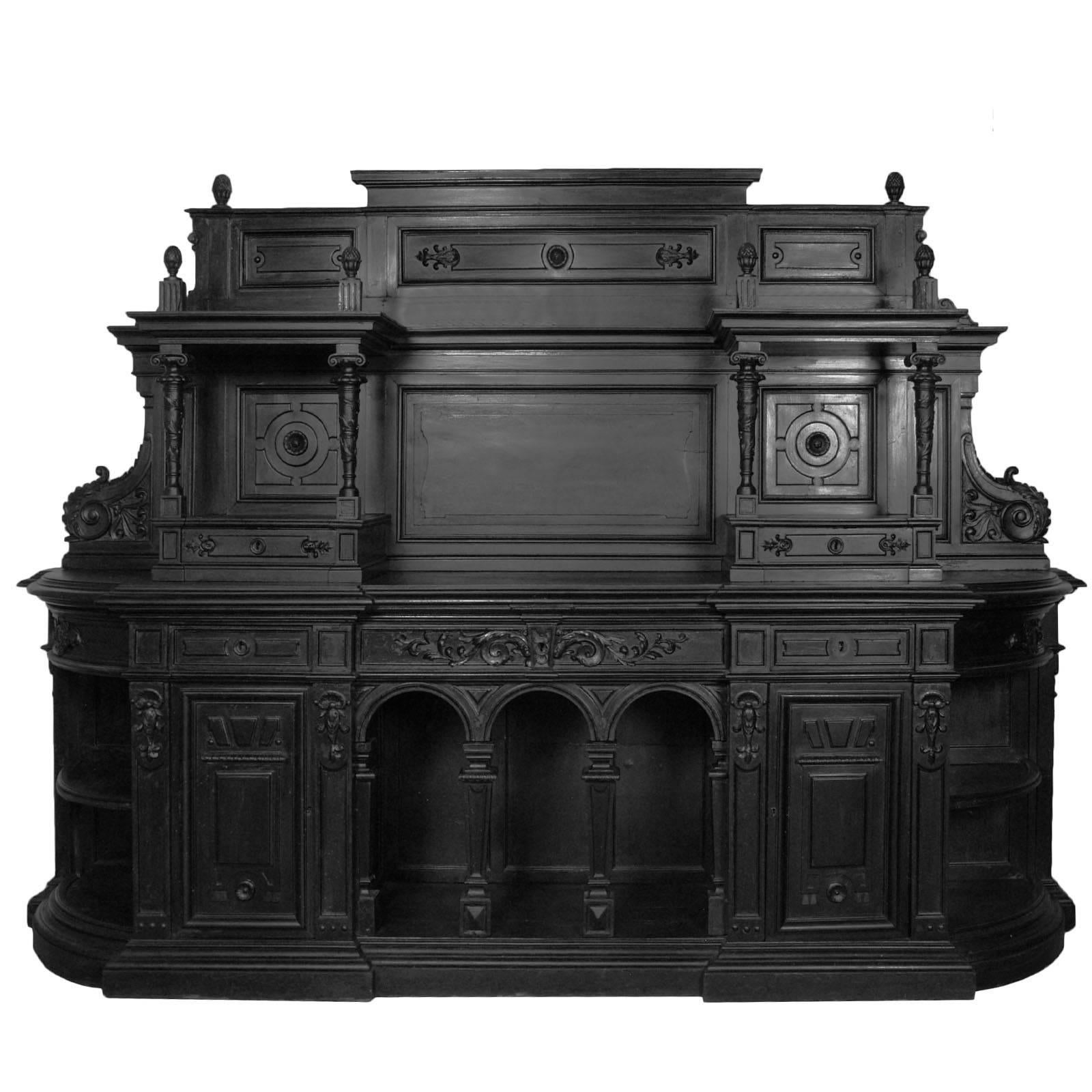 Monumental and important Renaissance Palladio dining room set all in solid hand-carved walnut from a Palladian Palace in Vicenza of a Venetian patrician family.

The back of the showcase was rebuilt again at the end of the 800 first 900 with the
