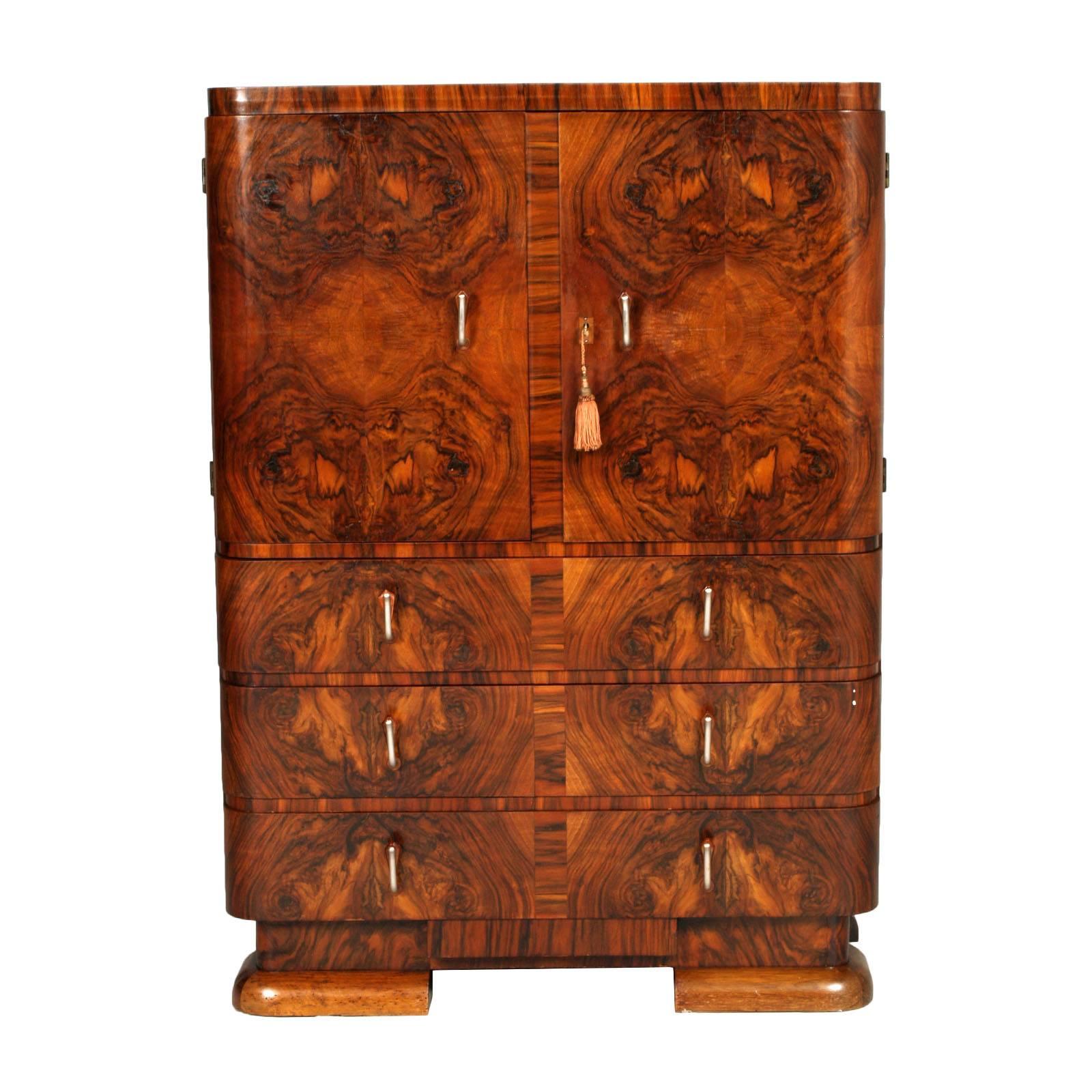 Exquisite refined Art Deco cabinet dresser by Crafts Cantu in walnut and burl walnut applied in excellent condition all original components, polished with wax

Measures cm: H 133 W 95 D 45.