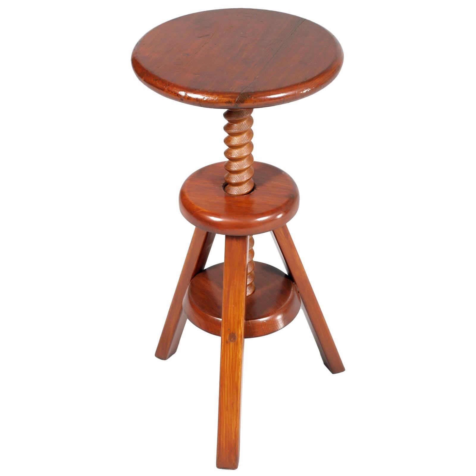 1950s Tyrolean adjustable tripod stool, in red larch polished to wax

Measures cm: Height 45/60, diameter 32.