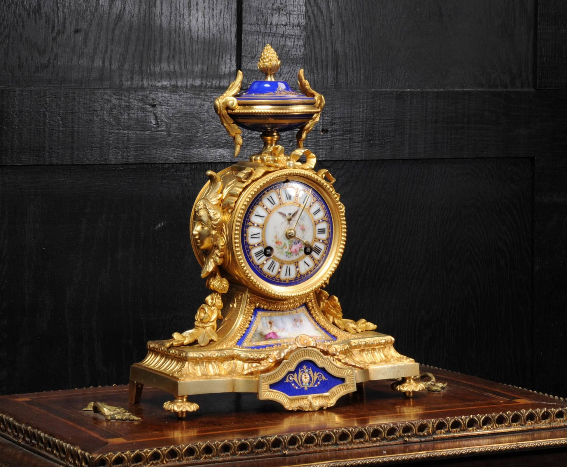 A most exquisite original antique French clock by the famous maker Japy Freres. It is finely modelled in ormolu (finely gilded bronze), beautifully finished and in stunning condition. It is mounted with beautiful Sevres style porcelain, each piece