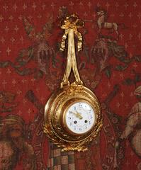 Pendule murale ancienne de style Louis XVI en ormolu