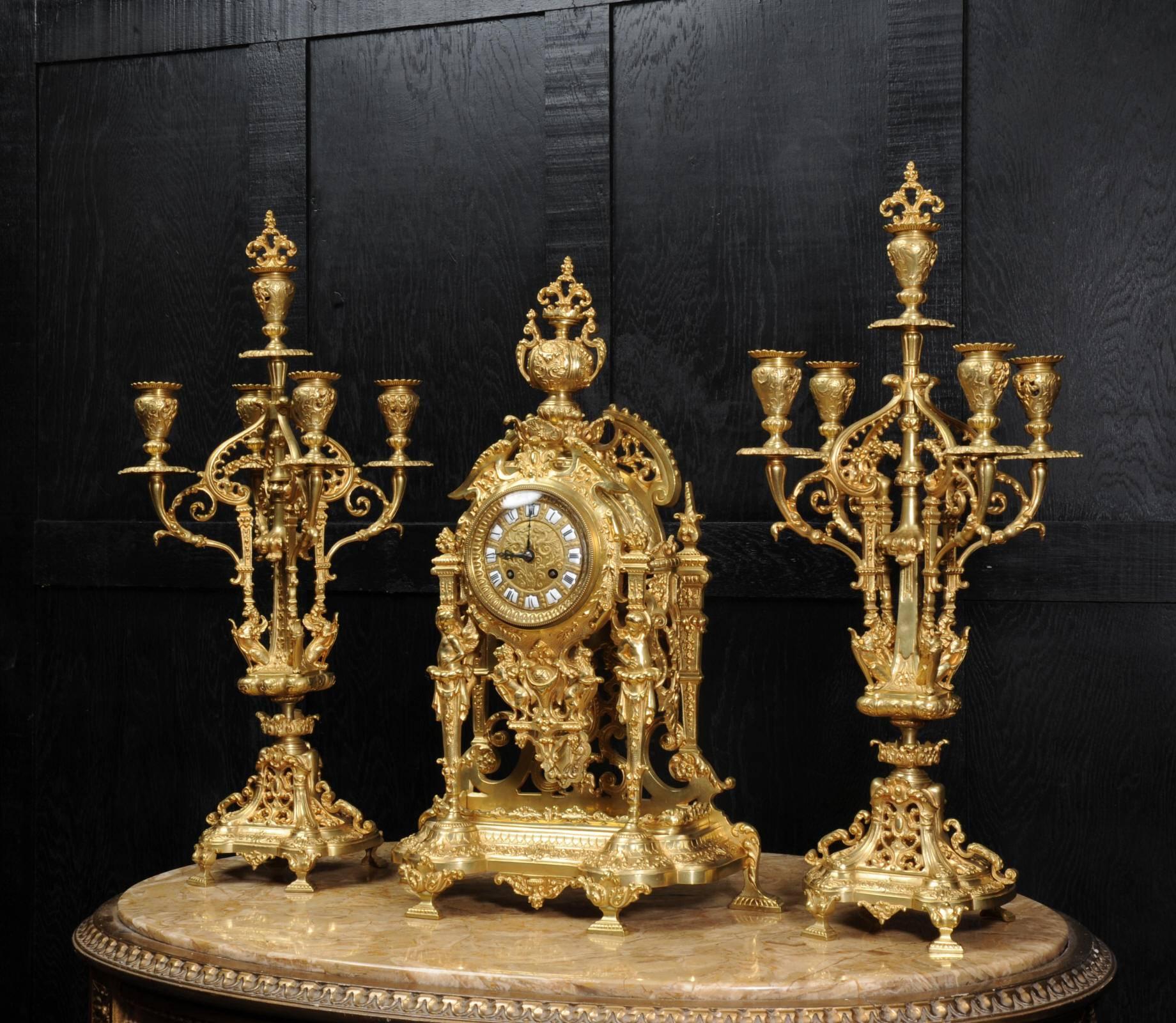 Baroque Large and Stunning Gilt Bronze Clock Set with Visible Pendulum