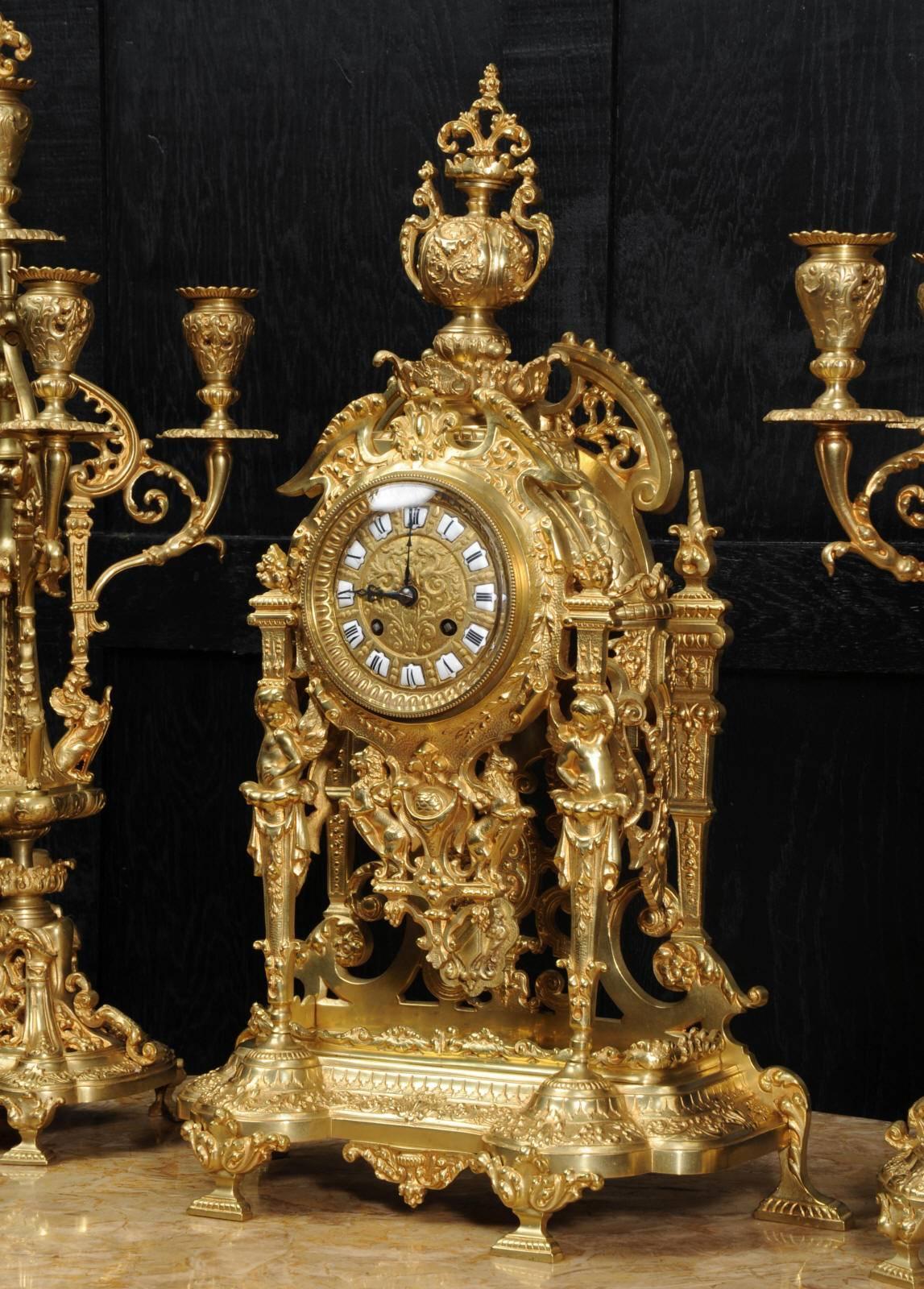 19th Century Large and Stunning Gilt Bronze Clock Set with Visible Pendulum