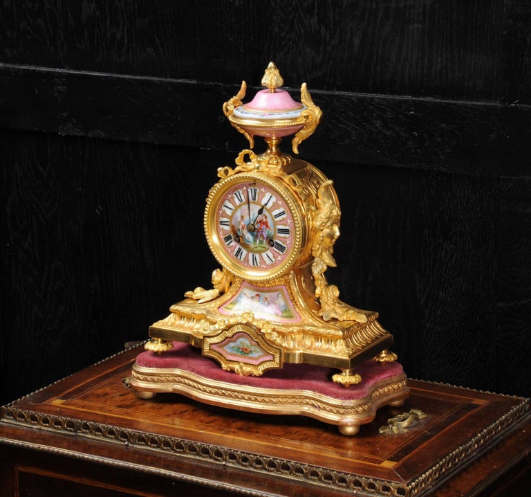 A stunning original antique French boudoir clock by the renown maker Achille Brocot and retailed by the illustrious London firm of Charles Frodsham & Co. Date is circa 1880. It is made of exquisite ormolu (finely gilded bronze) mounted with
