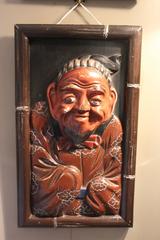 Pair of Oriental Carved Lacquered Wooden Wall Plaques