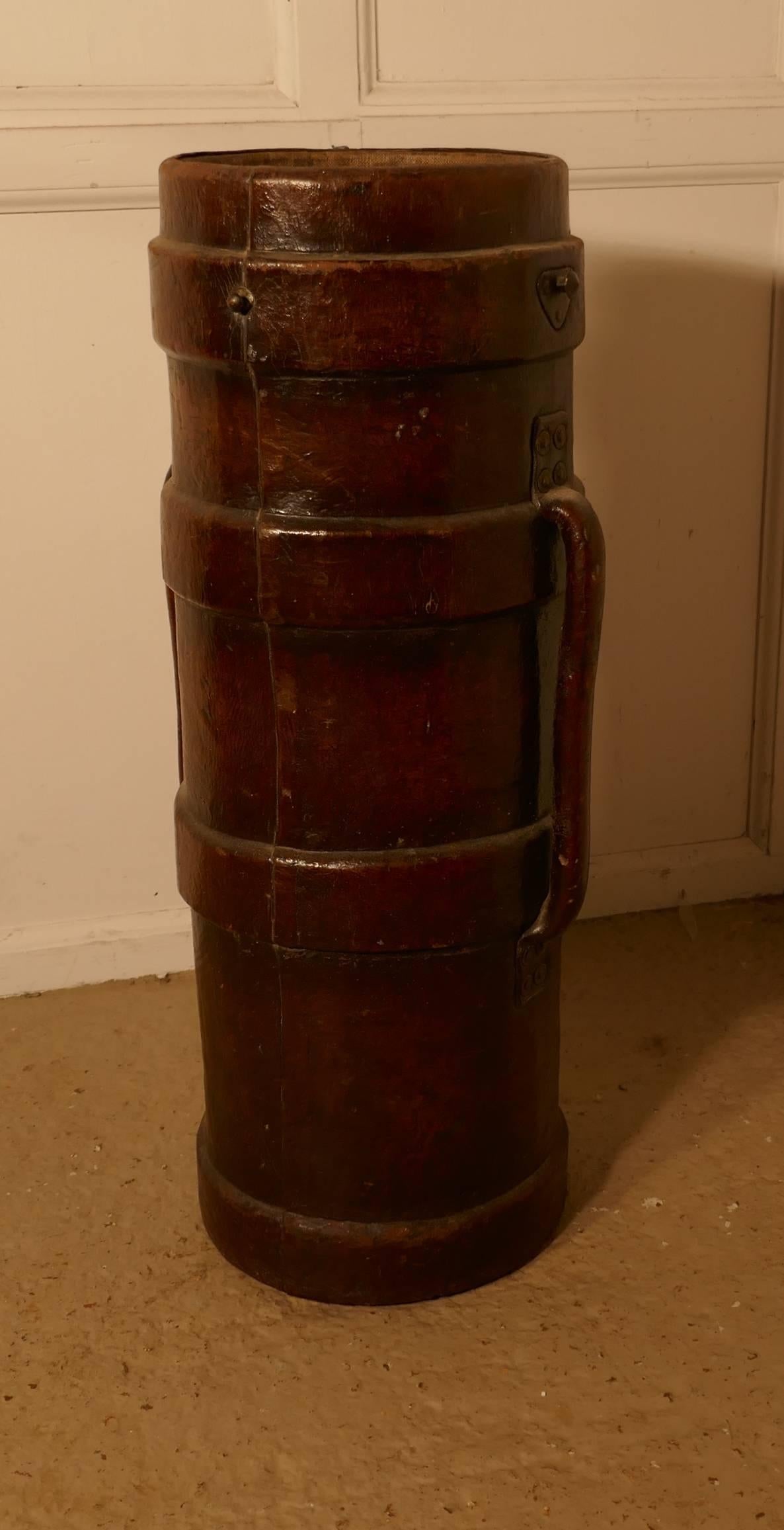 Quirky leather umbrella stand, or WWI moulded leather artillery shell carrier with three reinforced bands

This really handsome piece would make a fantastic umbrella or stick stand.

This is an extremely rare early 20th century British leather