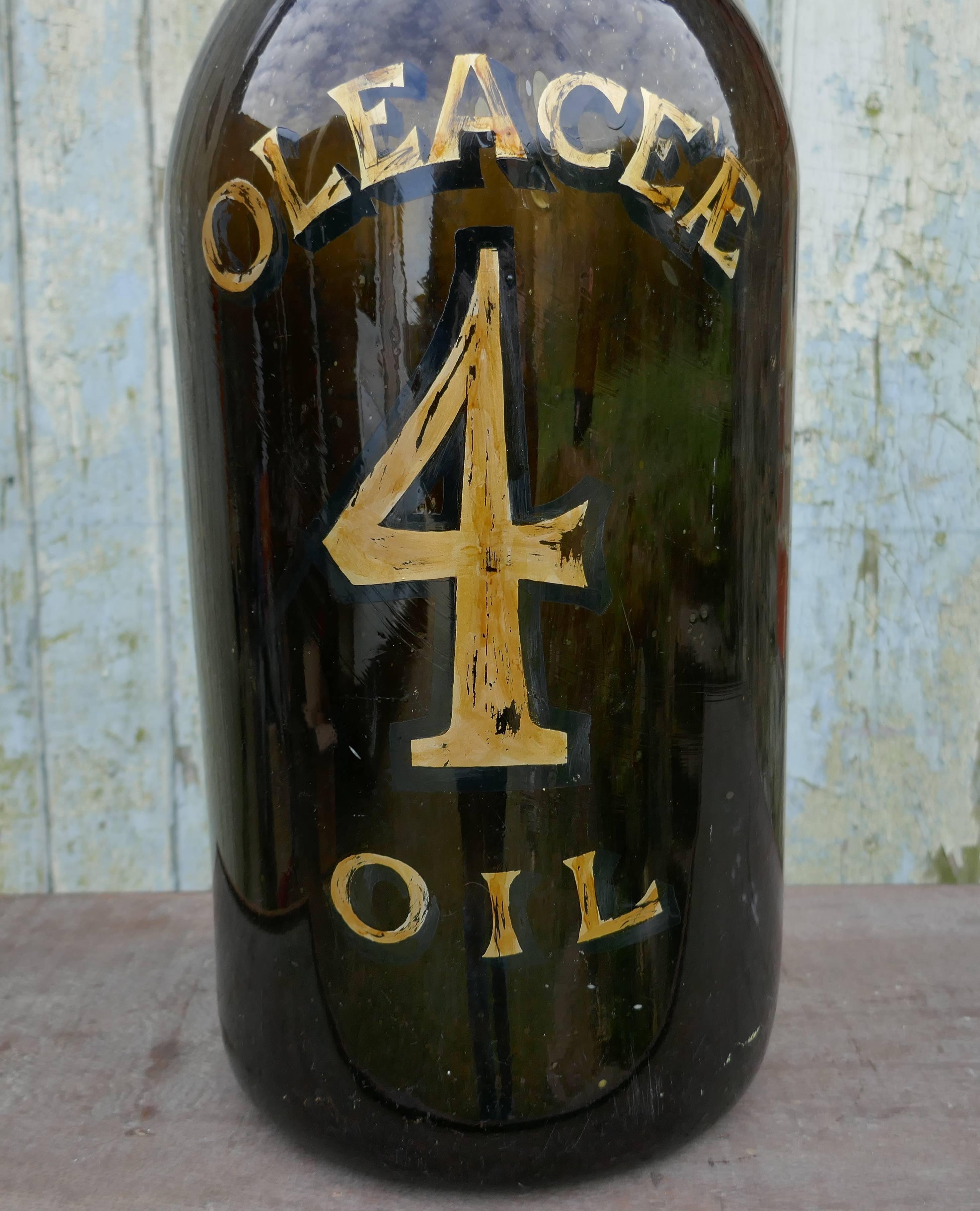 This is a super display piece, the bottle is made in brown glass, on the front it has the number 4 and OLEACEE OIL in Gold
The bottle is in god condition with only minor scuffing and they gold writing is in good condition
Measures: The bottle is