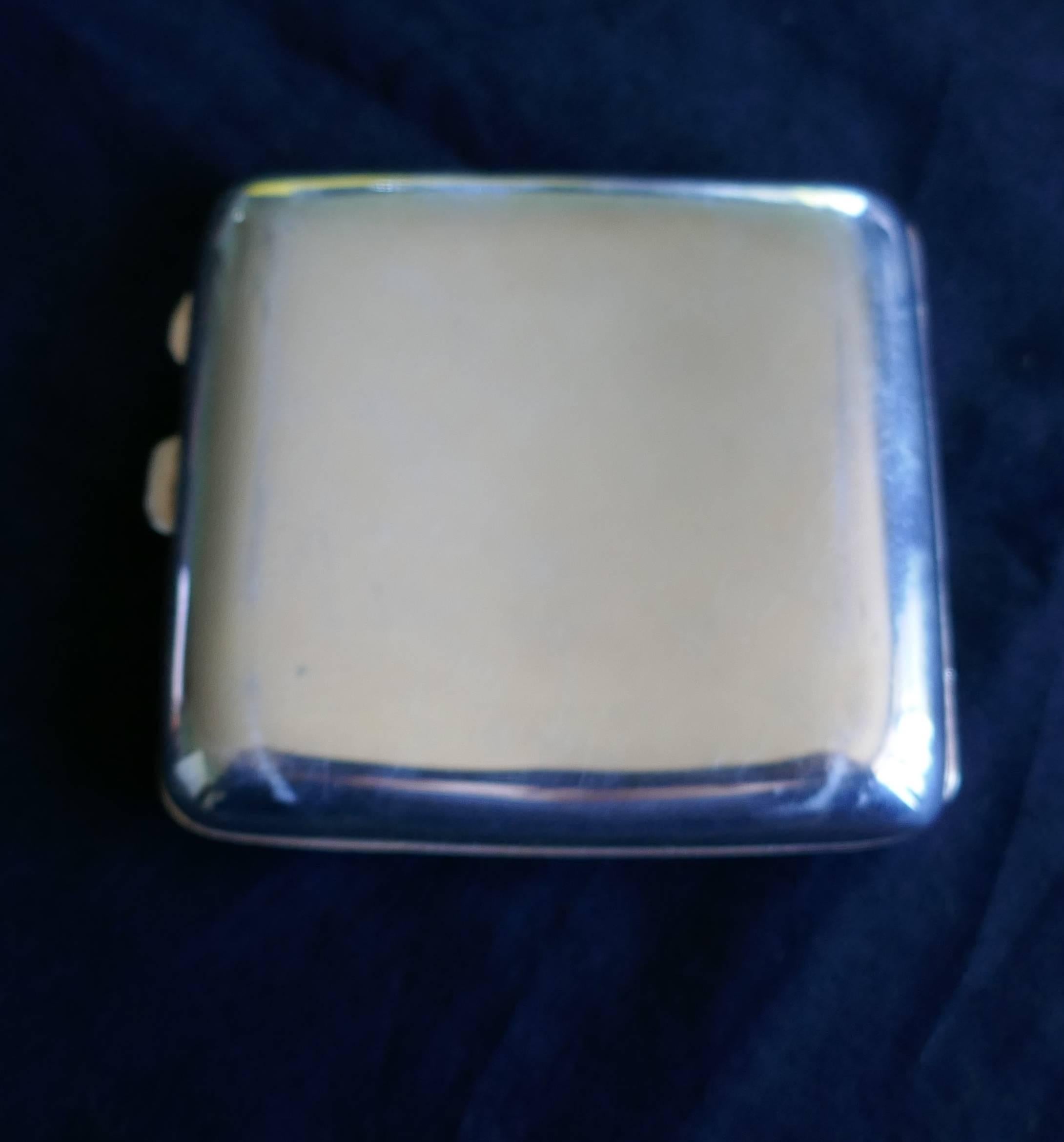 Magnificent Edwardian silver and risqué nude enamel cigarette or card case by Joseph Gloster Ltd

This is an exceptional antique Edwardian sterling silver cigarette case has a plain rectangular shape with rounded corners.
The charming young lady