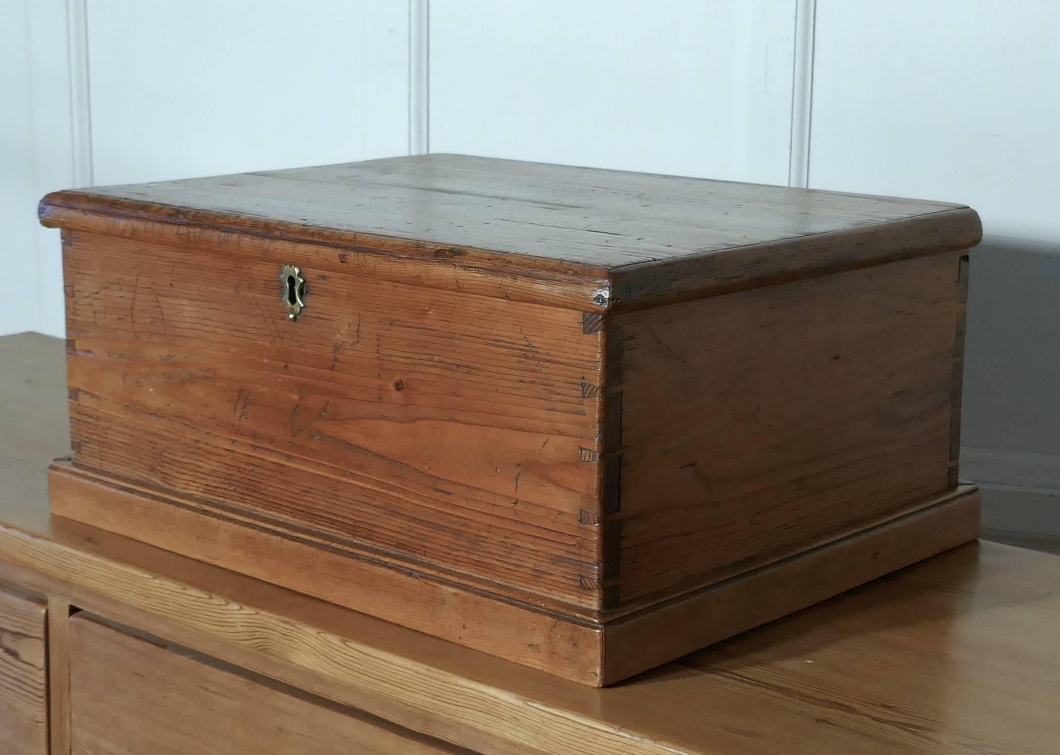 Small pine tabletop deed box 

This good quality little box, it is in its original condition it has never been painted just waxed to give it an aged and well used look
The box has a rounded moulded top edge and is of very solid construction, it