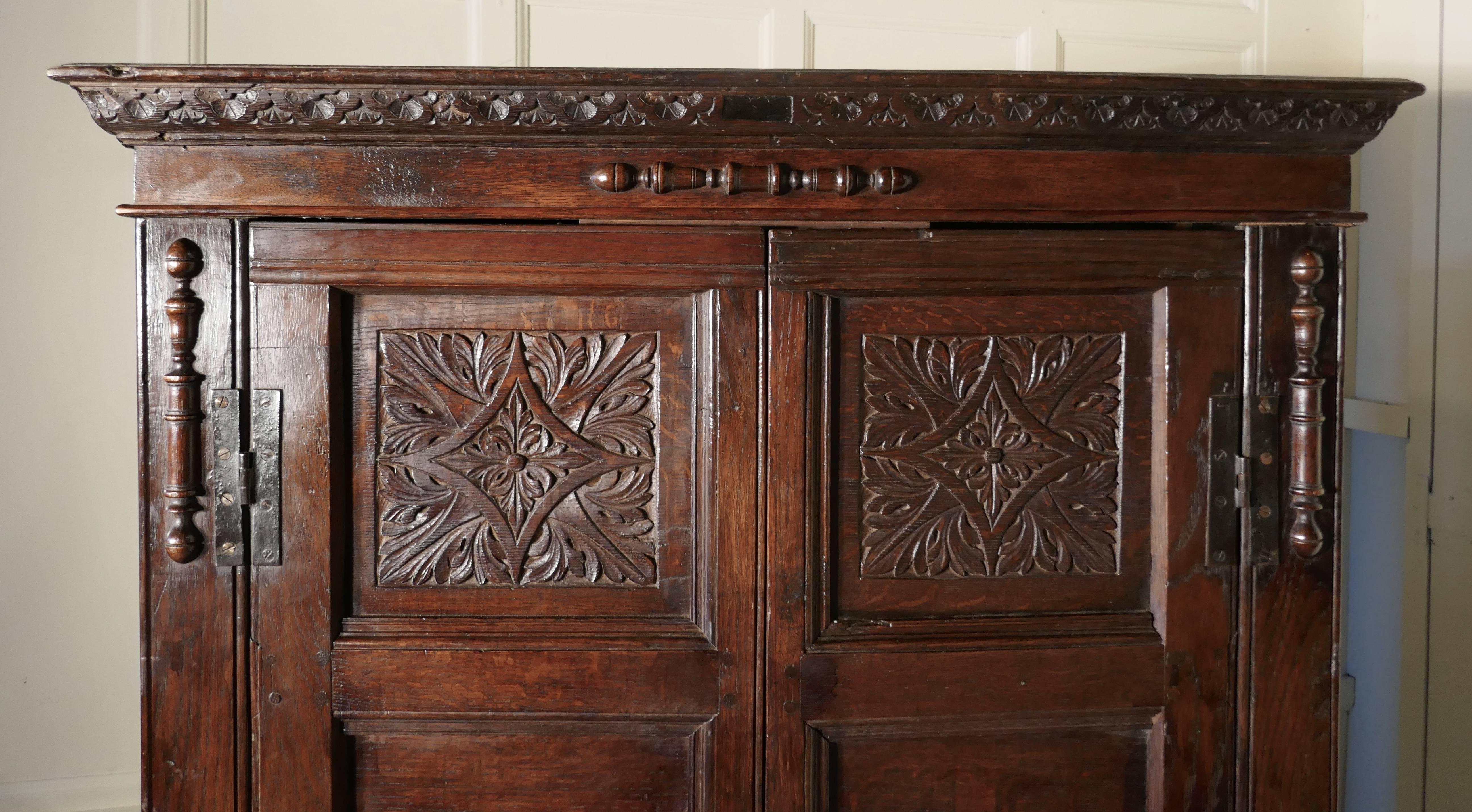 18th Century and Earlier 17th Century Carved Oak Cupboard or Wardrobe