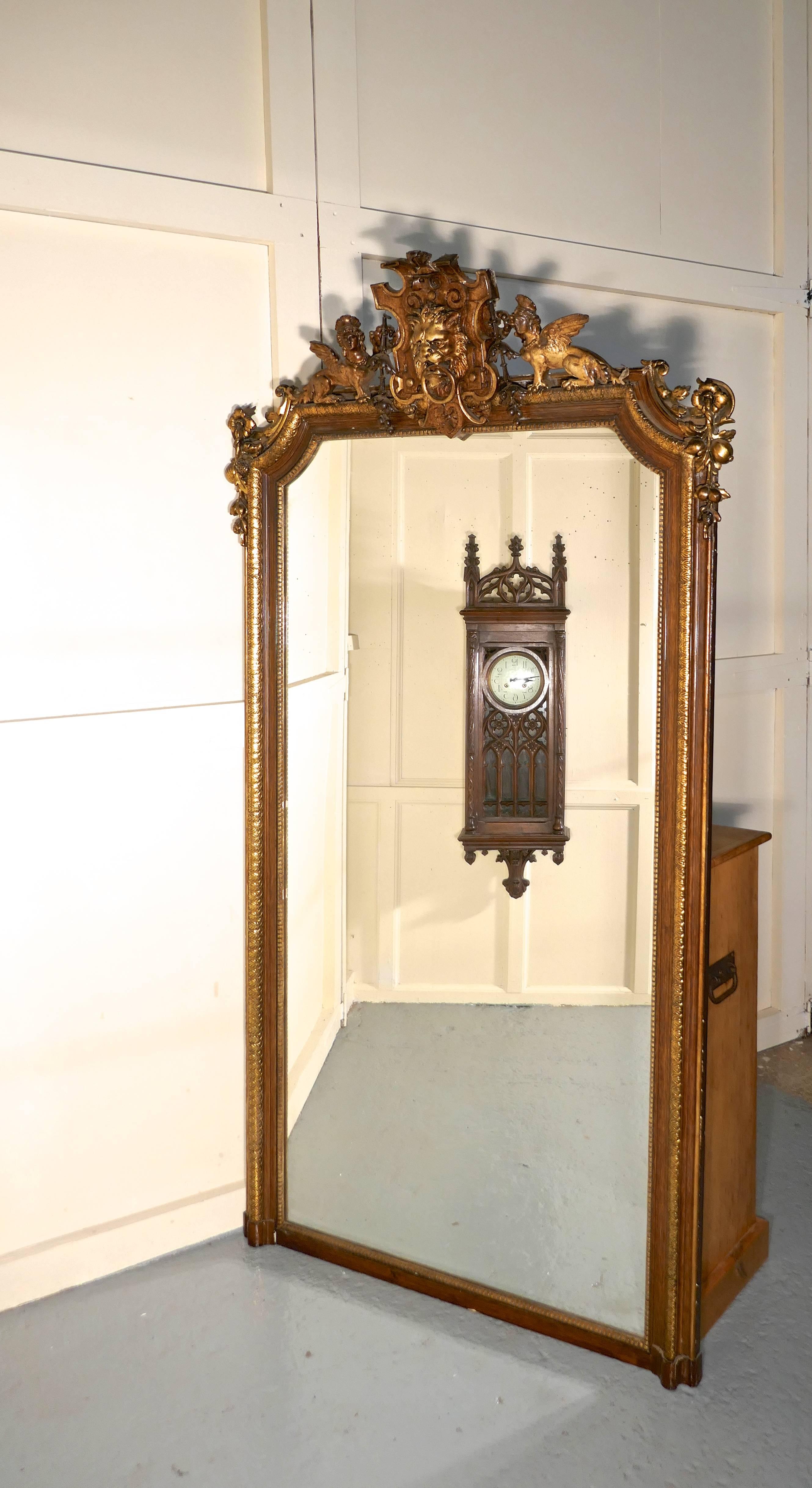 Very large French mirror, winged Sphinx and Lyons mask crest


This is an exquisite piece and taller than most Mirrors of this type, the centre glass is framed with gilt and rosewood.

There is an elaborate carved gesso and gilt crest on the