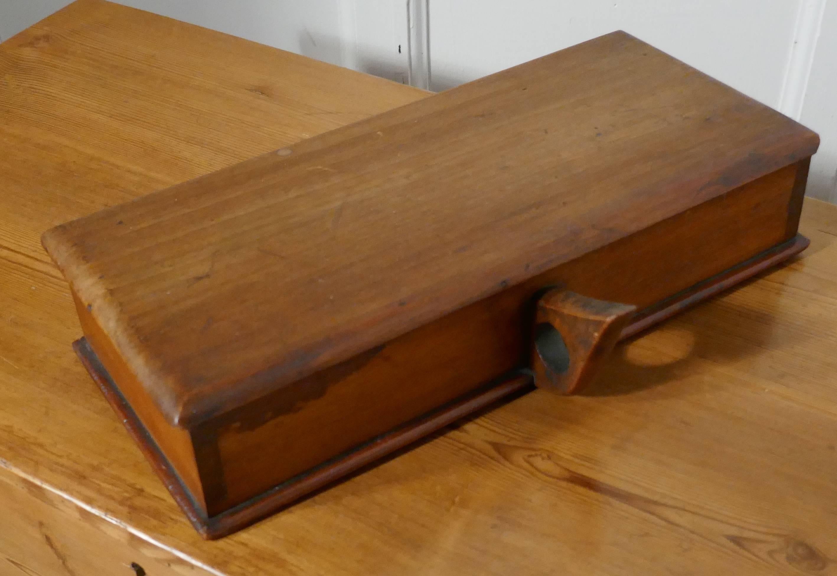 Victorian mahogany cigar box

This is rare item, the cigar box is the type used by a butler or waiter, it is made in Mahogany with handle at the back, the lid lifts towards the handle revealing four sections numbered in gold for the cigars and at