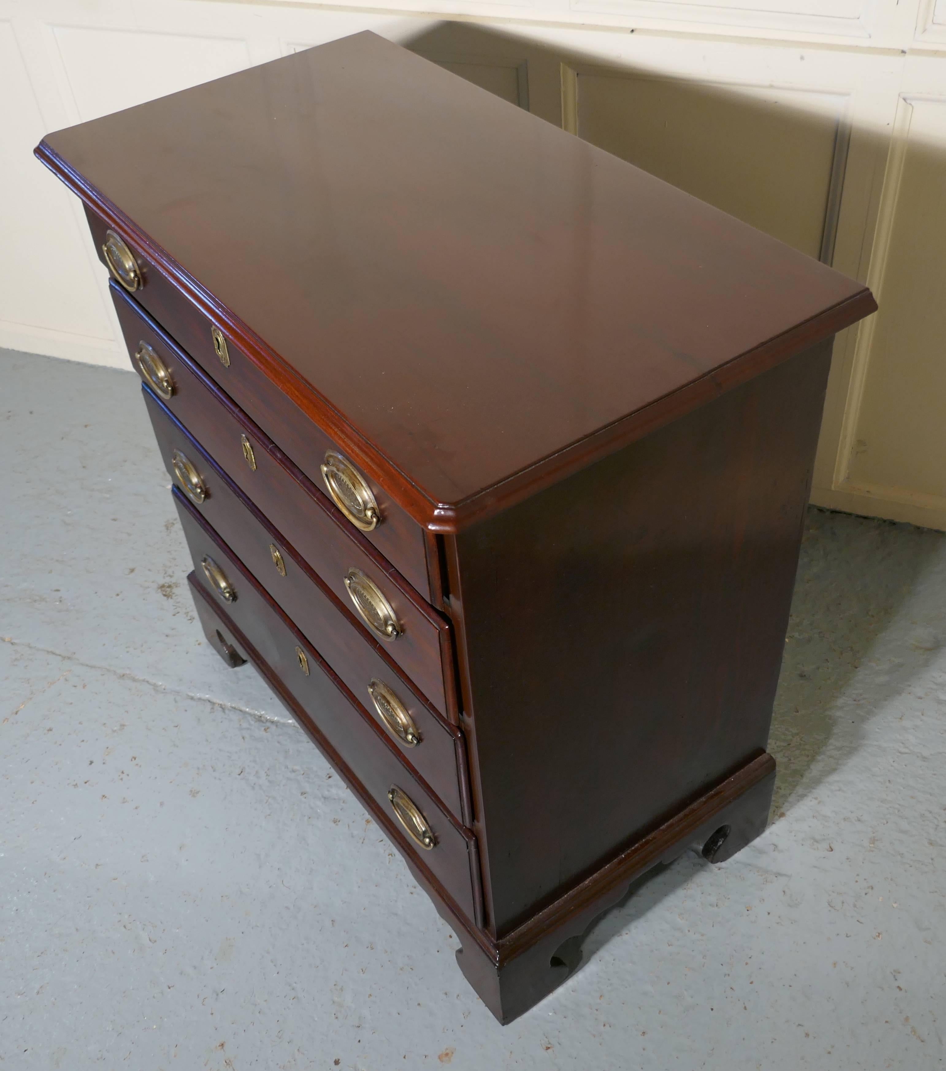 Georgian mahogany chest of drawers

This chest is a beautiful looking piece has four graduated long drawers, with brass oval plate handles and escutcheons, the drawers run very smoothly and it stands on bracket feet, it has a solid mahogany top