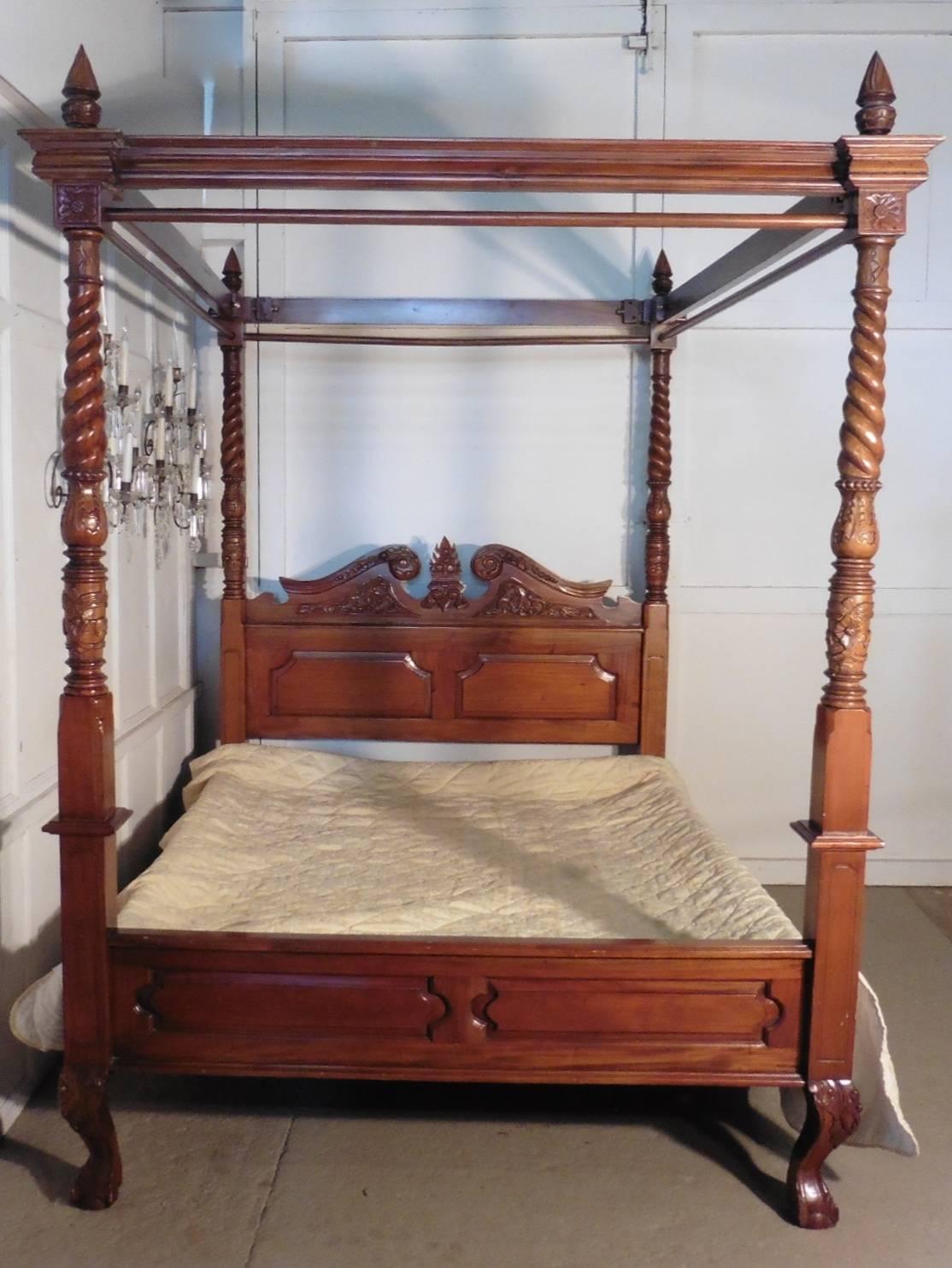 A large mahogany 5ft four-poster bed 

This a wonderful large Victorian style mahogany four poster bed, the bed posts are turned in mahogany, they have acanthus leaf carvings with an elegant twist at the top, the polished mahogany head board has a