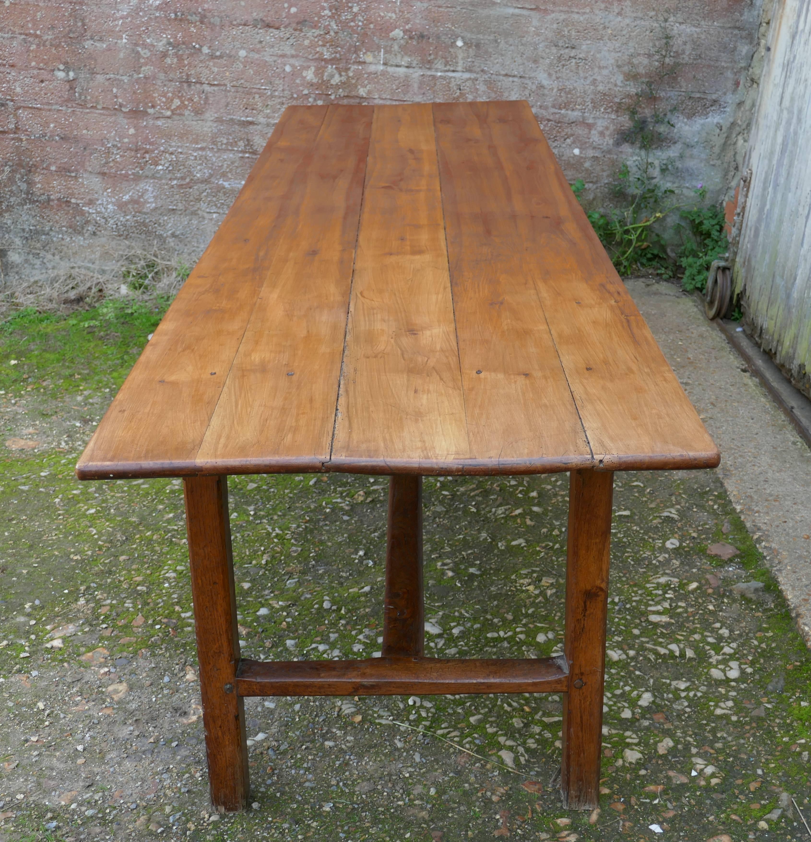 3 meter French cherrywood farmhouse table 


This is a lovely looking piece, the 1” thick solid cherrywood top is made from 4 wide planks, it has an interesting extra, half way along one side there is bread slide, very useful and could be used