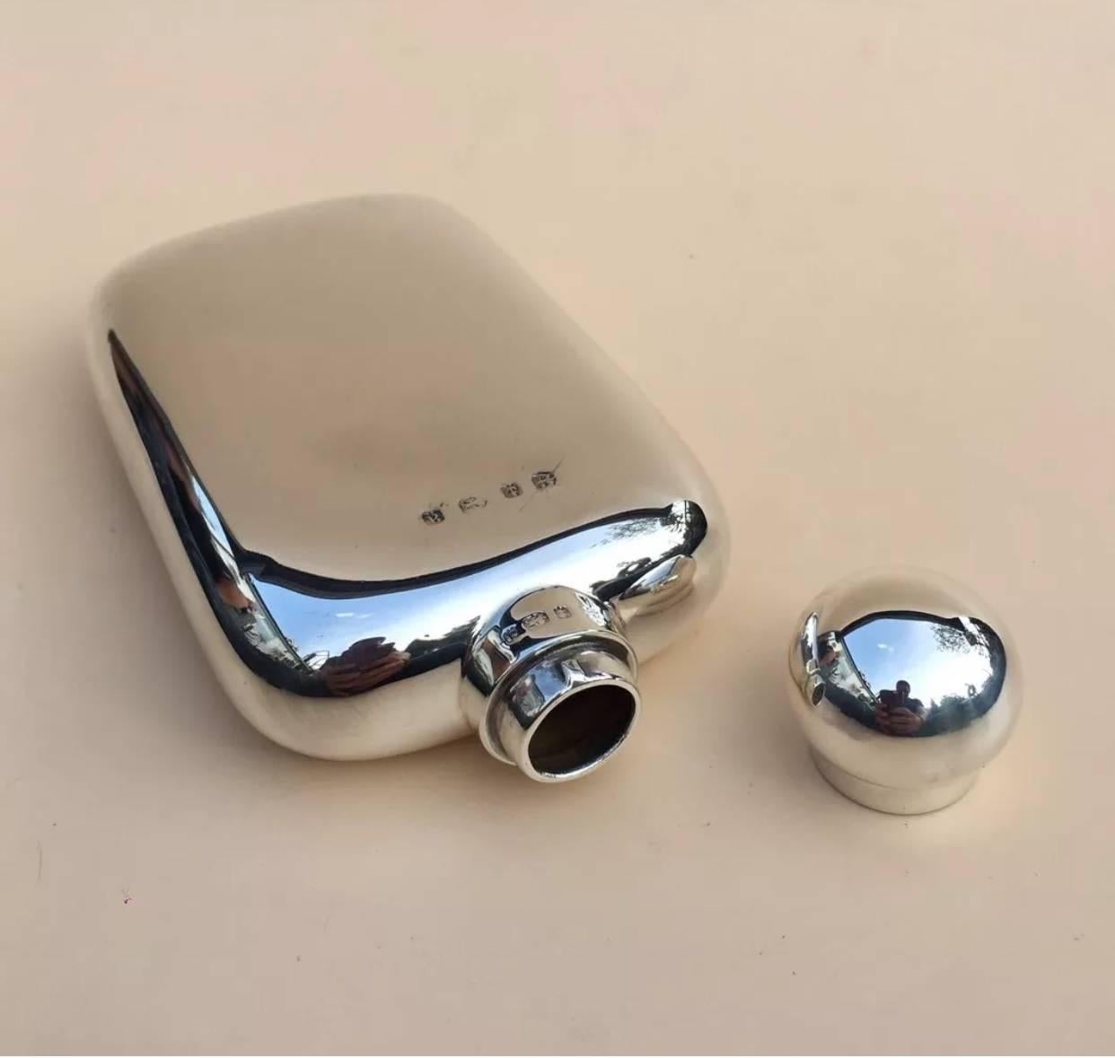 Fine quality vintage silver hip flask by Arthur & John Zimmerman, 1900

Very good quality silver hip flask, it has a nice curve to one side to fit in any pocket, the flask has a lid with turning grip.

The flask is in good condition, no dents,
