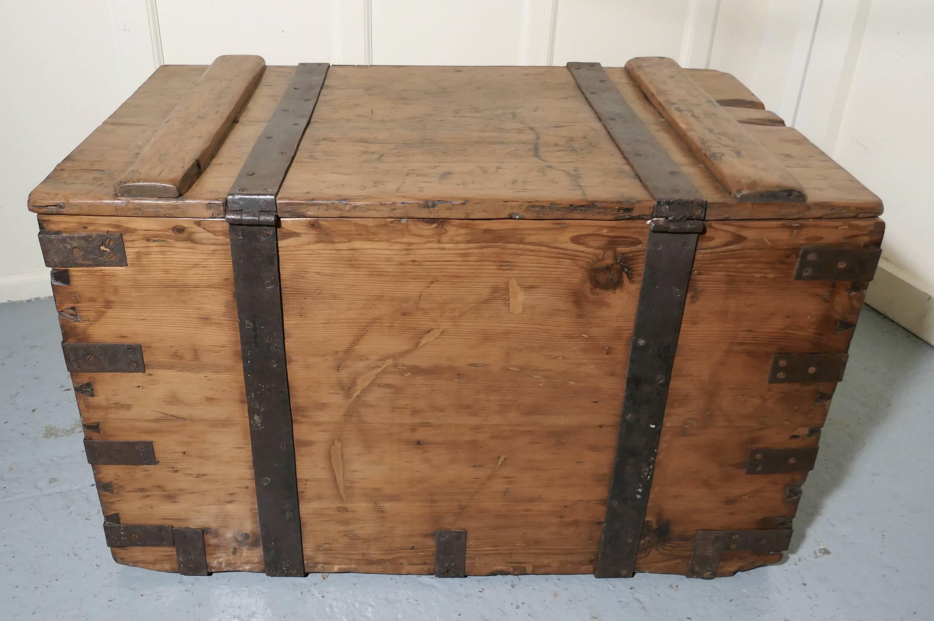 A large Victorian pine and iron bound sea or silver chest. 

This the heaviest and best quality box that you can imagine, it has heavy iron banding on the outside, a superb and large carrying inset handles and a large latch which can be