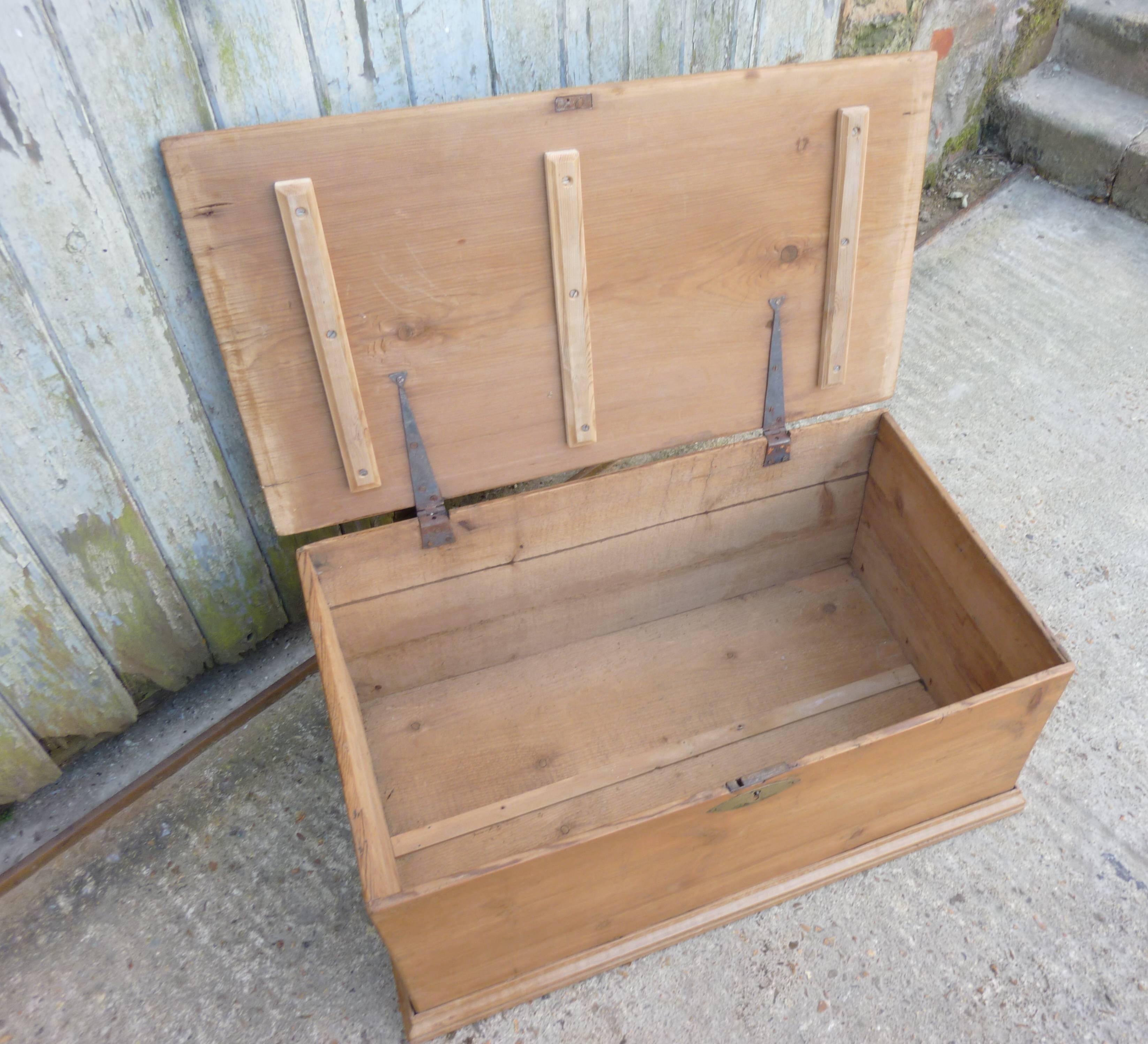 Victorian pine blanket box or coffee table

This good quality little box has a rounded moulded top and is of very solid construction, it has a brass escutcheon and original iron strap hinges and stands on a moulded plinth, the box is in very good