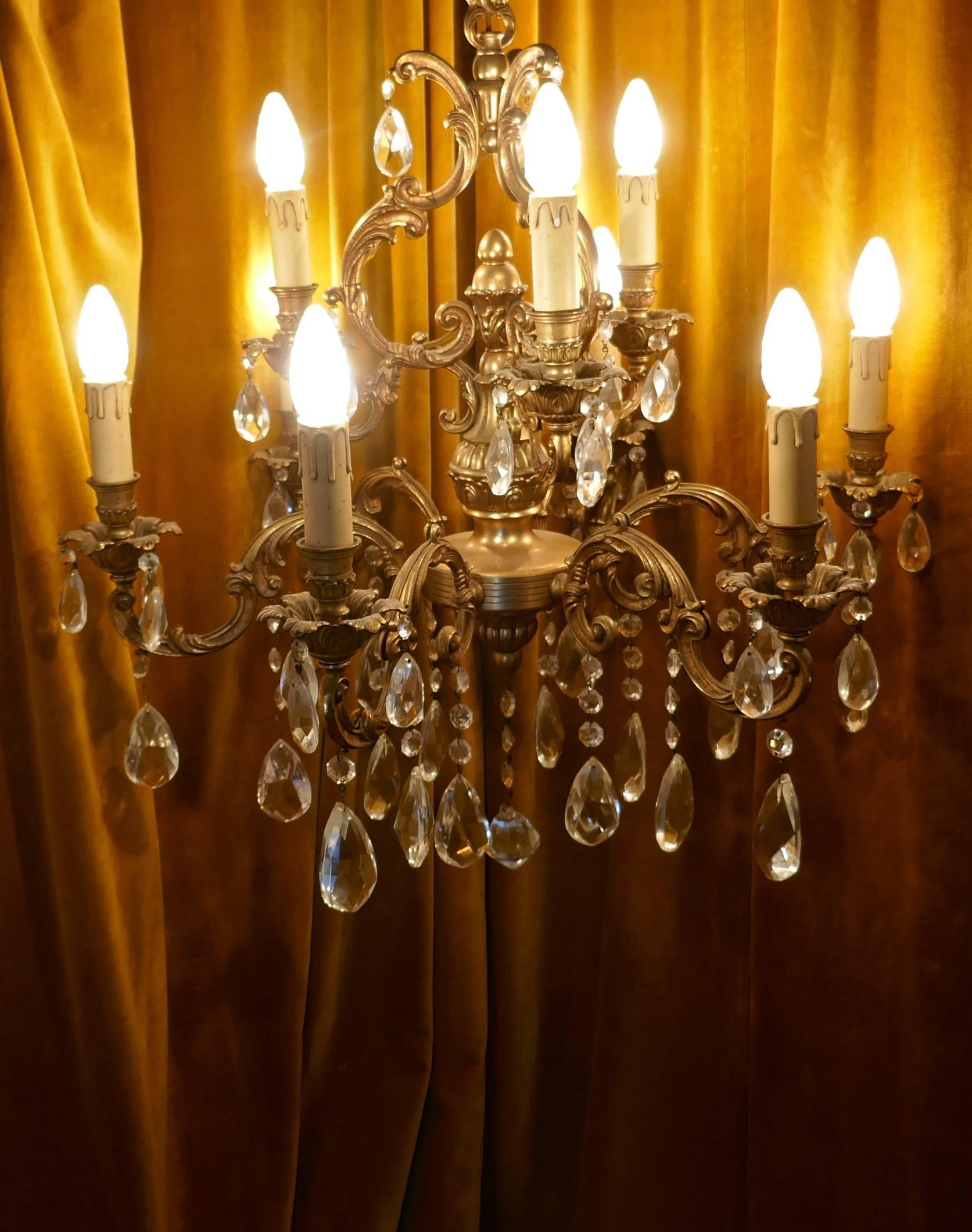 20th Century Charming Large French Crystal and Brass Nine-Branch Chandelier