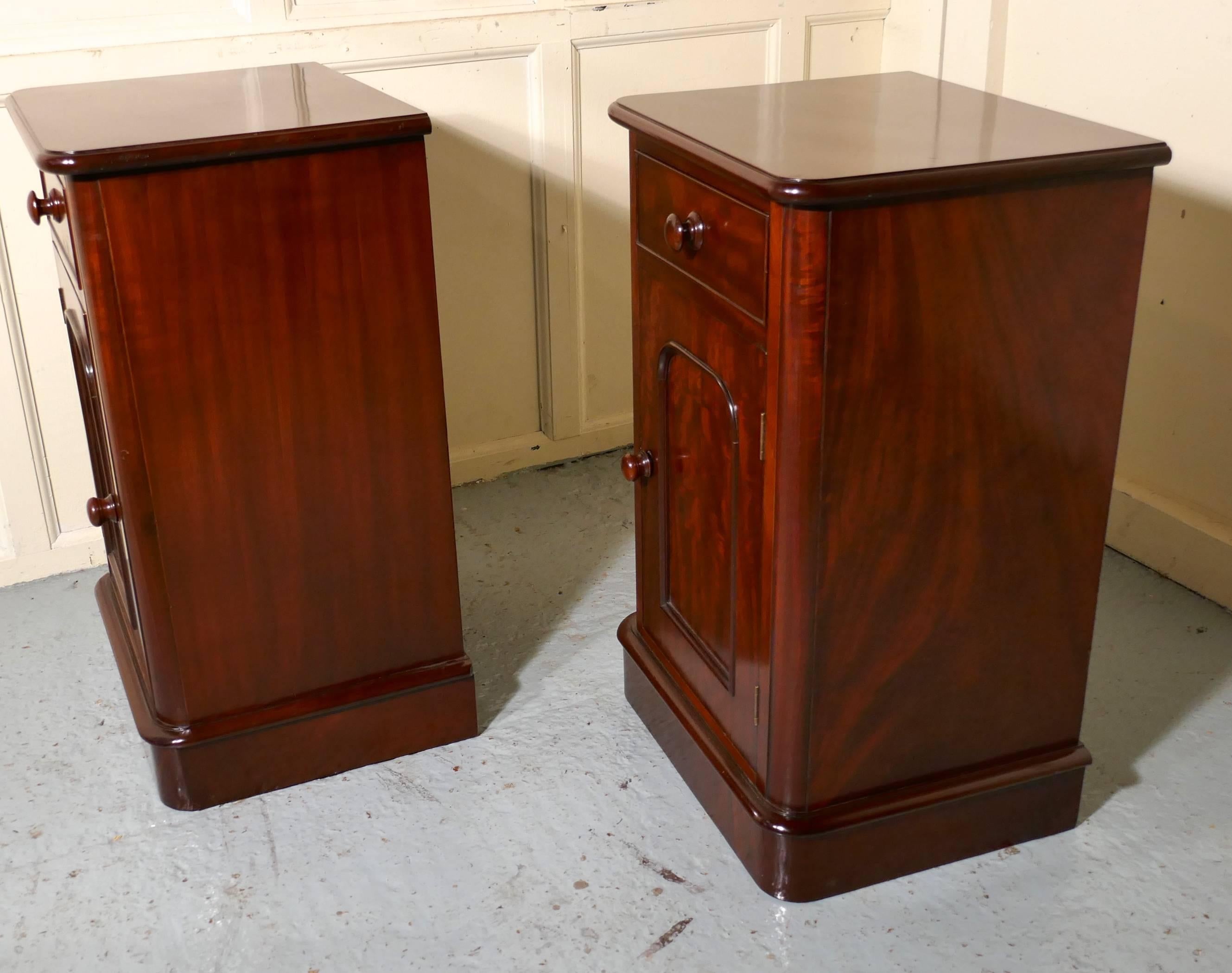 A pair of Victorian mahogany bedside cupboards

These are very good quality cabinets they are made in flame mahogany, each one has a drawer and a shelved cupboard beneath, they are true pair as the doors open in opposite directions.
The cabinets