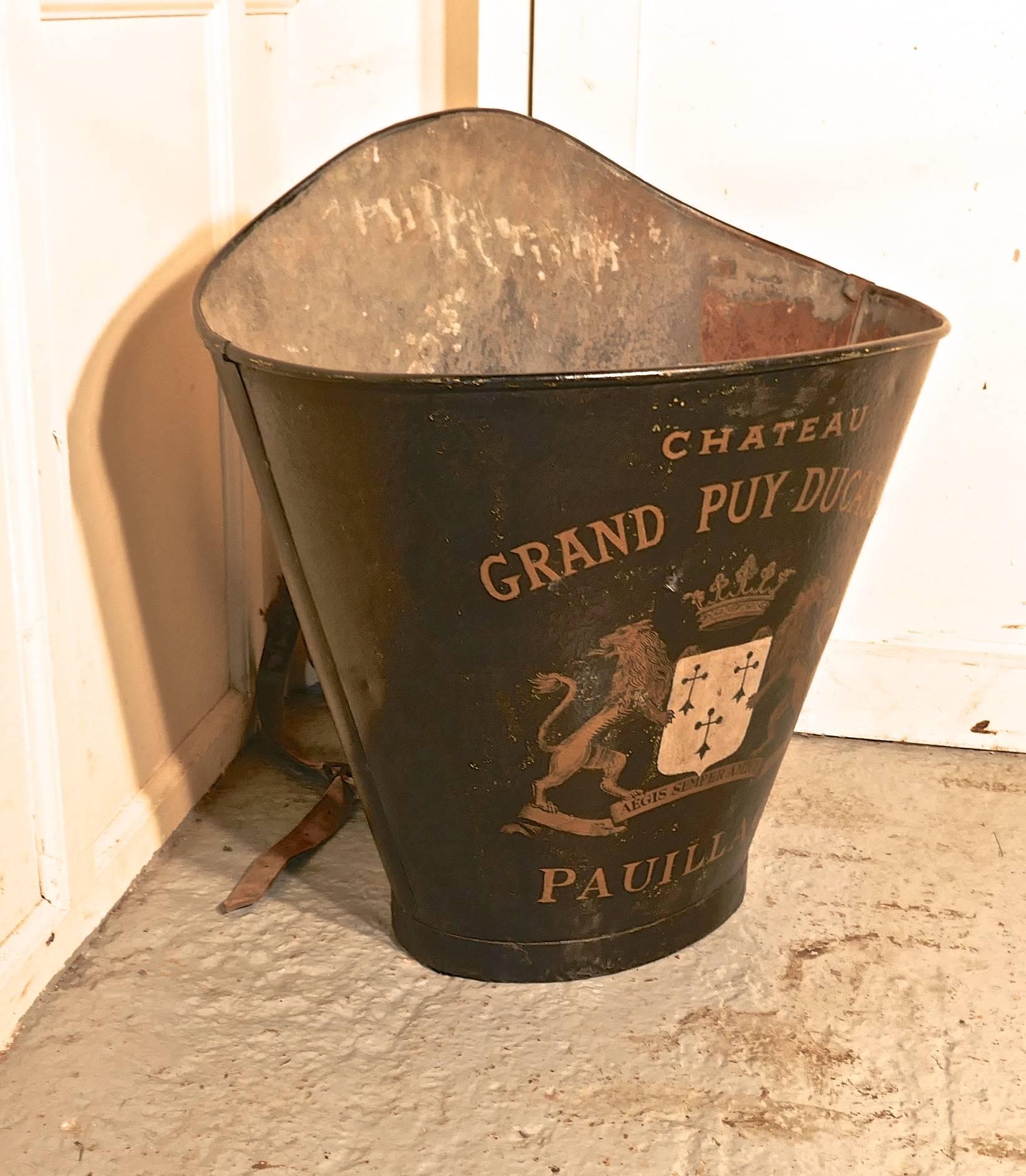 19th century French vineyard grape hod from Chateau Grand Puy Ducasse Pauillac

A French grape hod from the Medoc Region I the South of France, this galvanized hod would have been worn on the back of the grape picker. The hod has a painted black