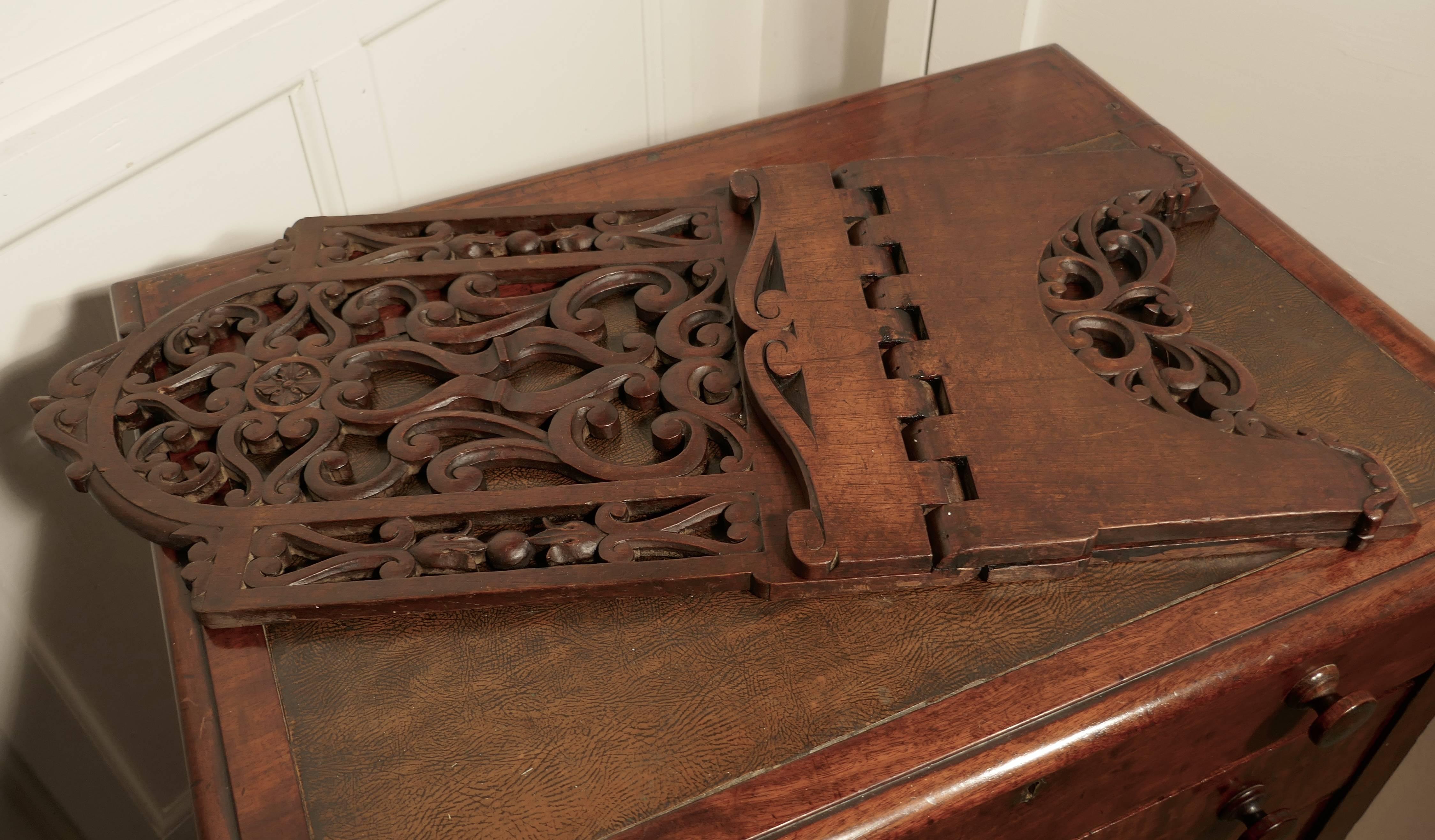 Very large French Arts & Crafts book rest, Ecclesiastical reading stand, Lutrin

This is a charming piece, known in France as a Lutrin, it came from a presbytery, this one has a lot of carved and pierced decoration 

The stand has been superbly