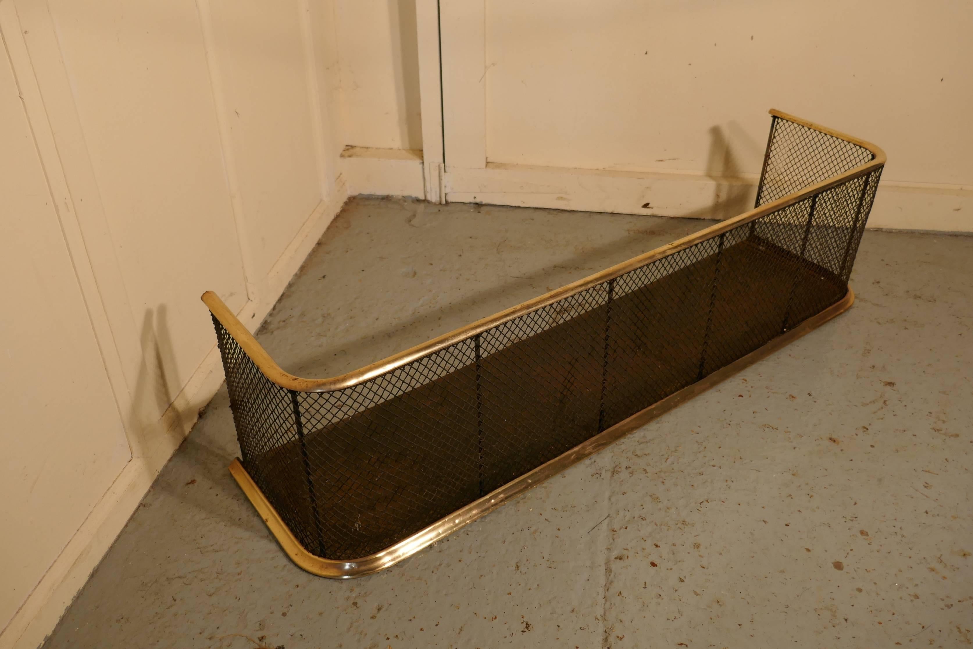 Victorian nursery fire guard or club fender 

An early Victorian antique club fender often known as a nursery guard as it completely surrounds the fire
This is a heavy quality piece, it has a slightly curved brass top rail and another brass rail