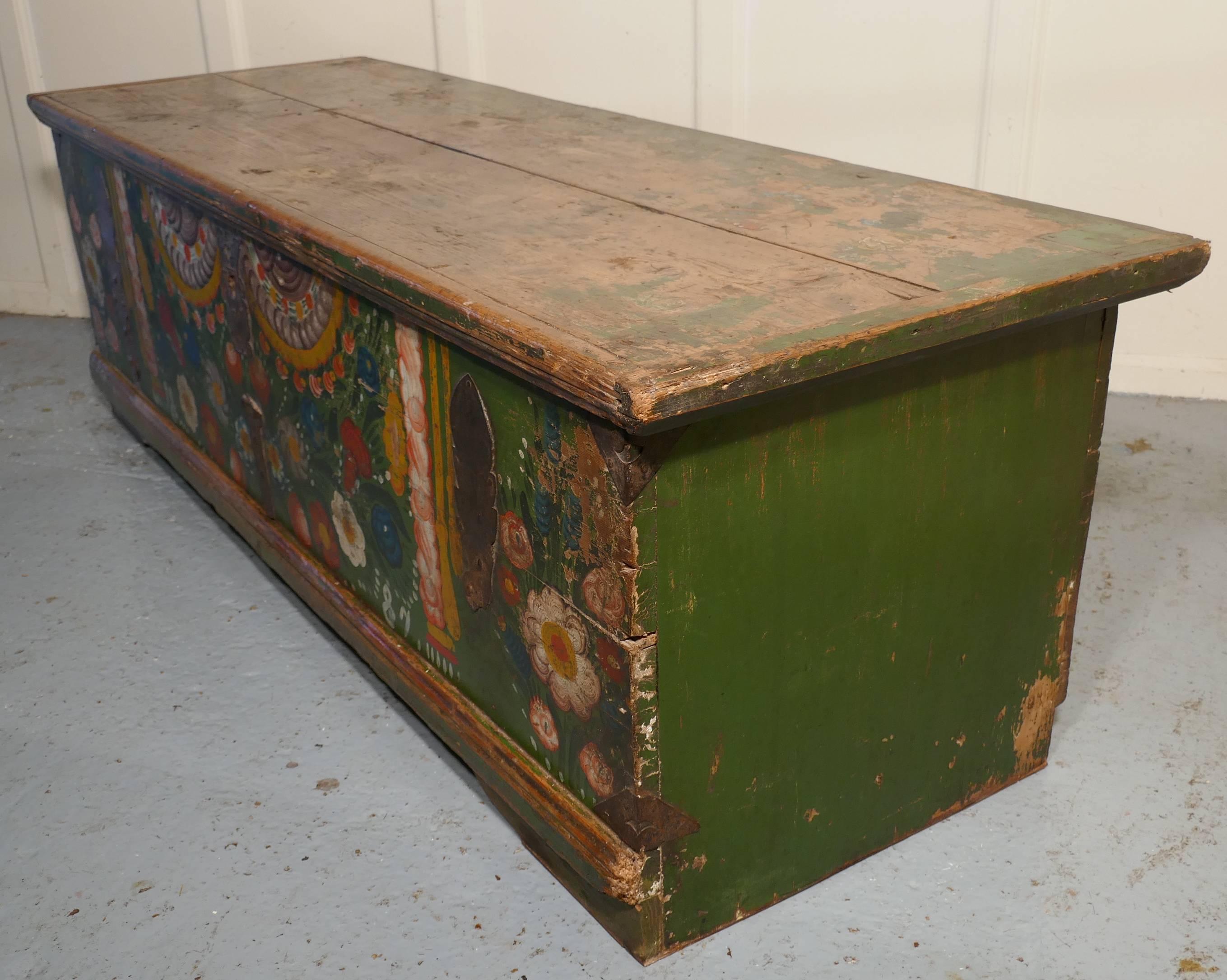 European Folk Art painted pine chest

This is an unusual piece, the chest has been partly stripped back revealing wonderful painted decoration, much of this seems to have been lost either when it was repainted or when it was stripped, but there is