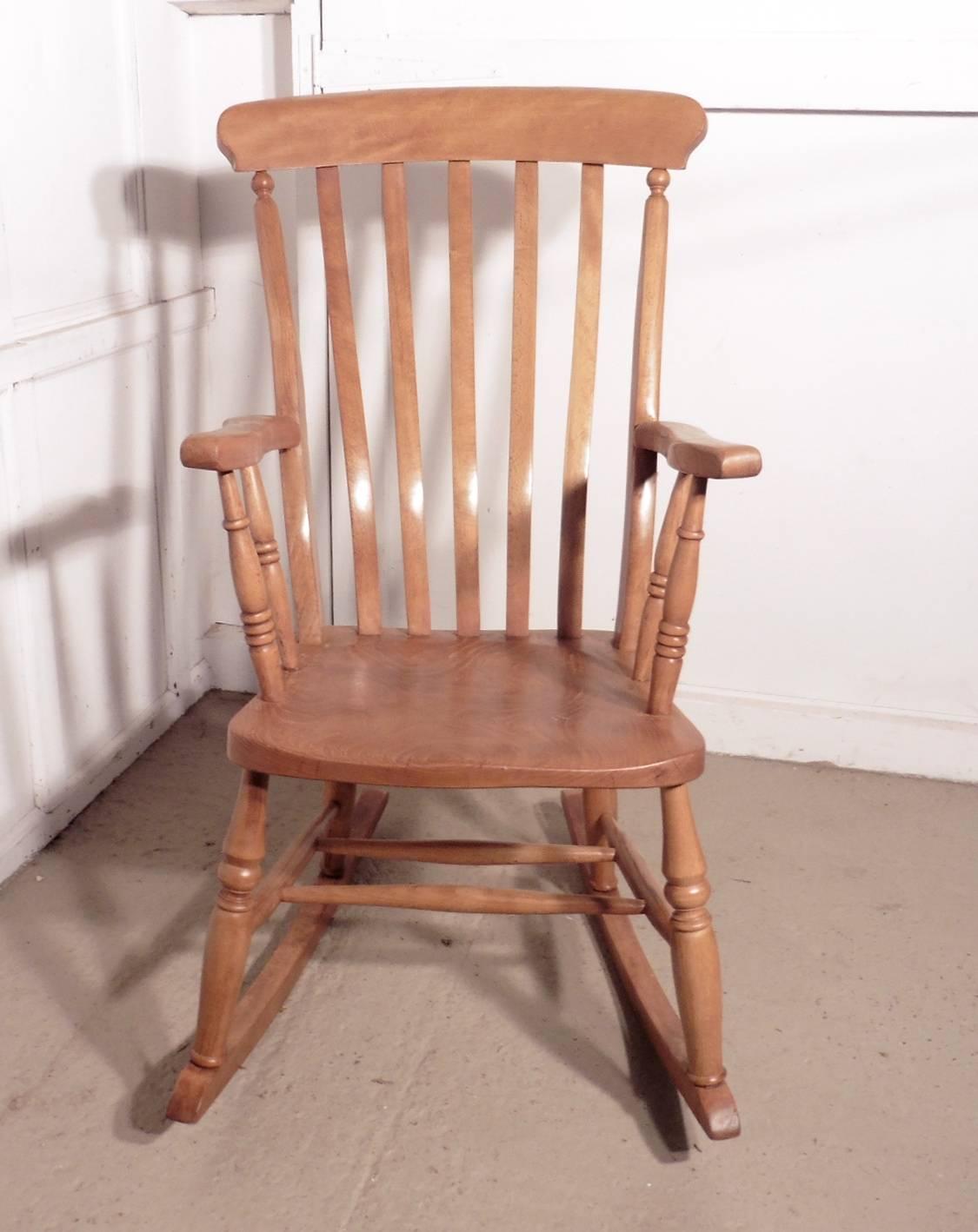 English Victorian Beech and Elm Slat Back Carver Rocking Chair