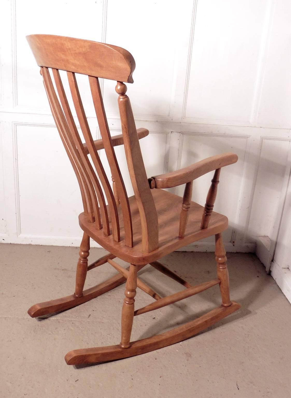 Victorian beech and elm slat back carver rocking chair

This superb old granddad chair has the most beautiful golden patina, and a beautifully figured elm seat
The chair has a high slat back and very attractive turnings on the legs and arm