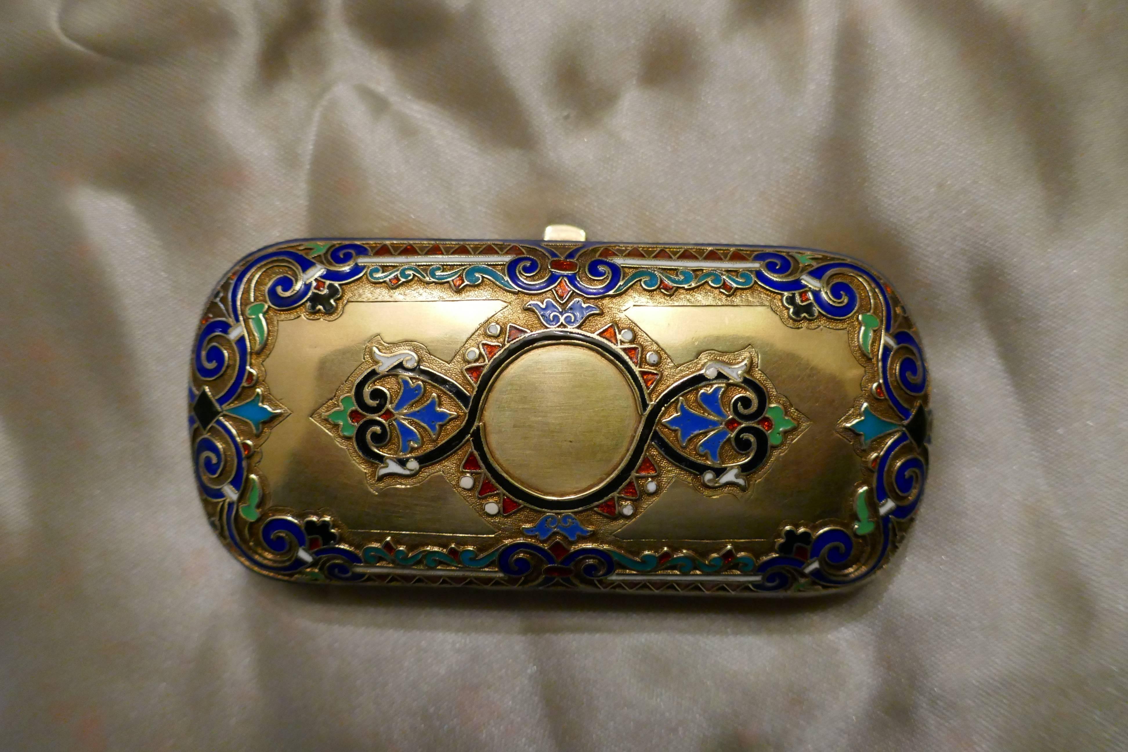 Early 20th century Russian silver gilt cloisonné case

This beautiful piece is lavishly decorated, but with a different design on each side.
One side has a centre plain roundel, ideal if you wanted to engrave on the case, the other side is more