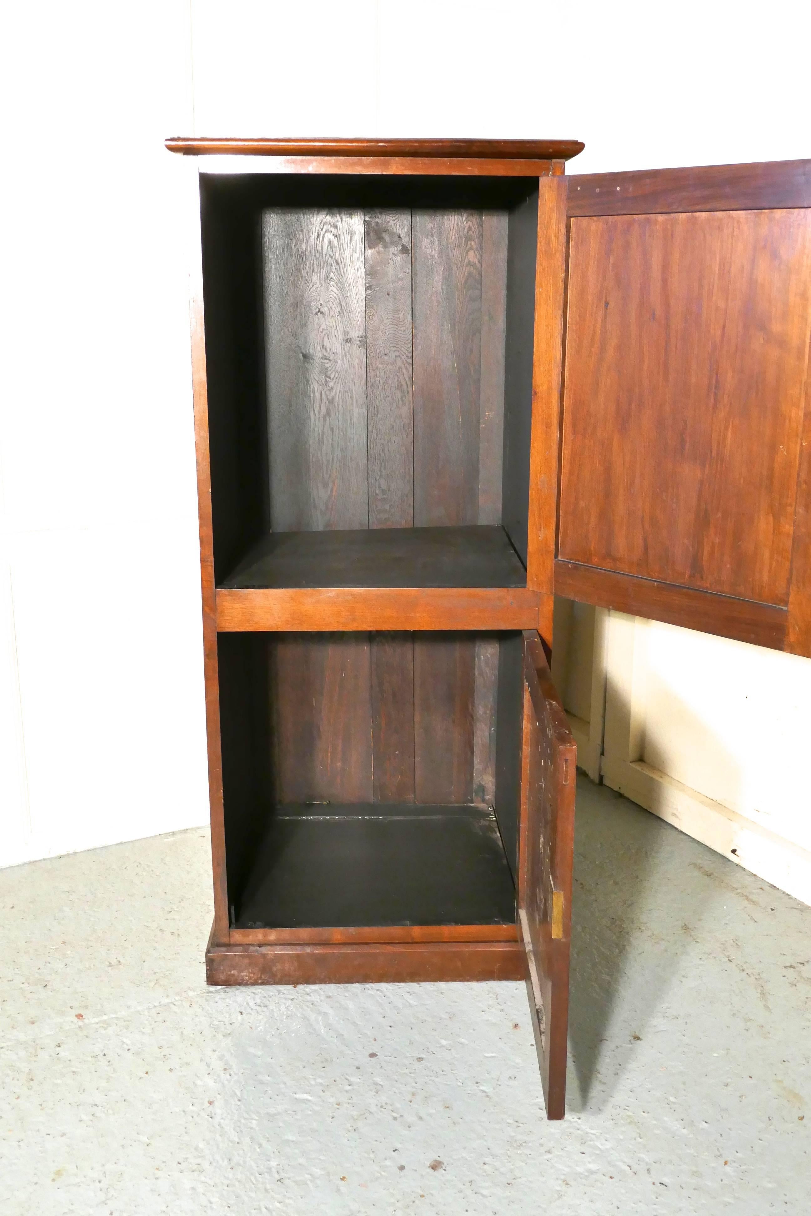 Girton and Newham hall book cupboard from Cambridge University

A hall book cupboard from Cambridge University, the cupboard has two panelled doors with graduate names from both Girton and Newham Colleges and dating from 1902 in gold on the
