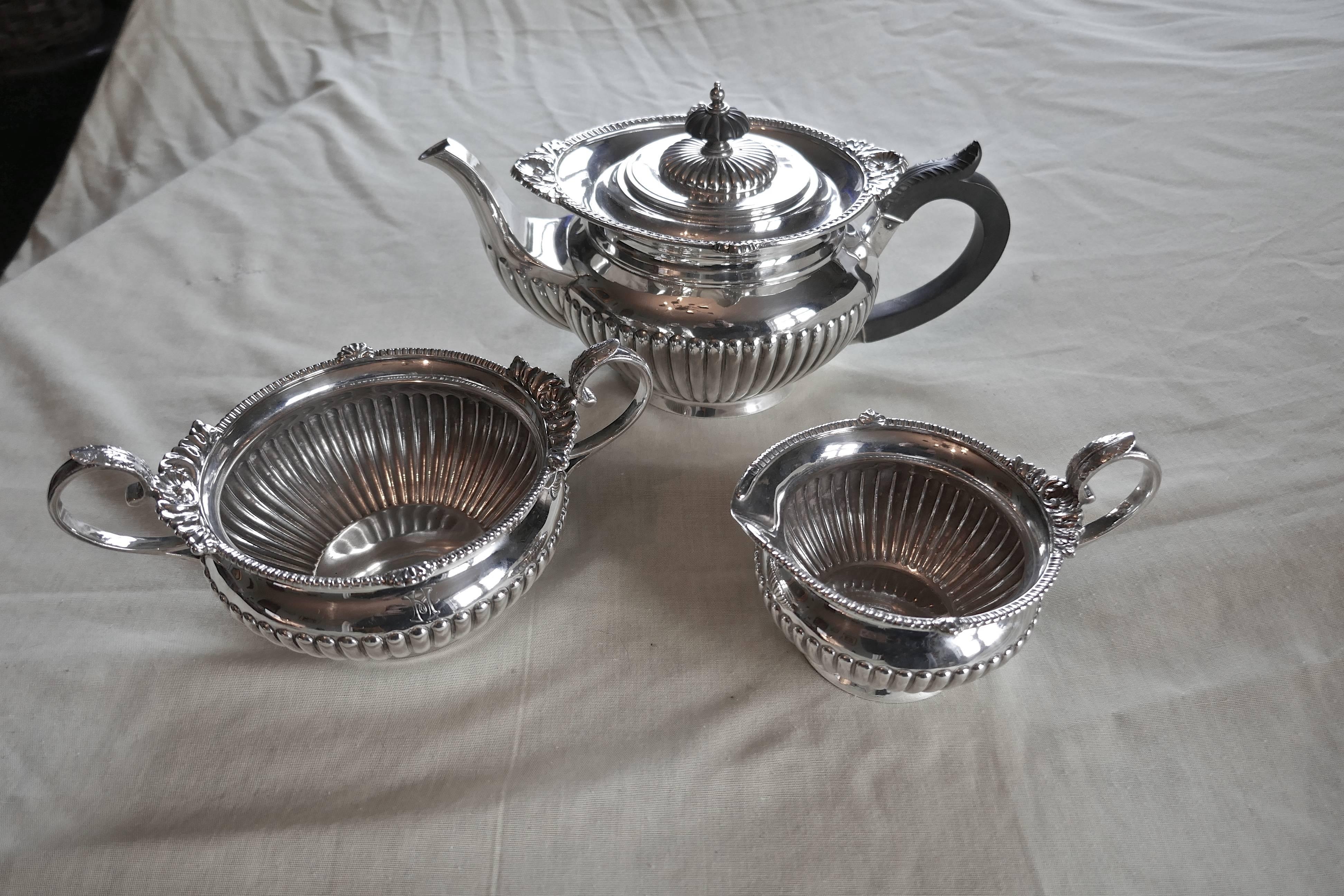 19th Century  Three-Piece Silver Tea Set by Walker & Hall, Sheffield, 1894 For Sale