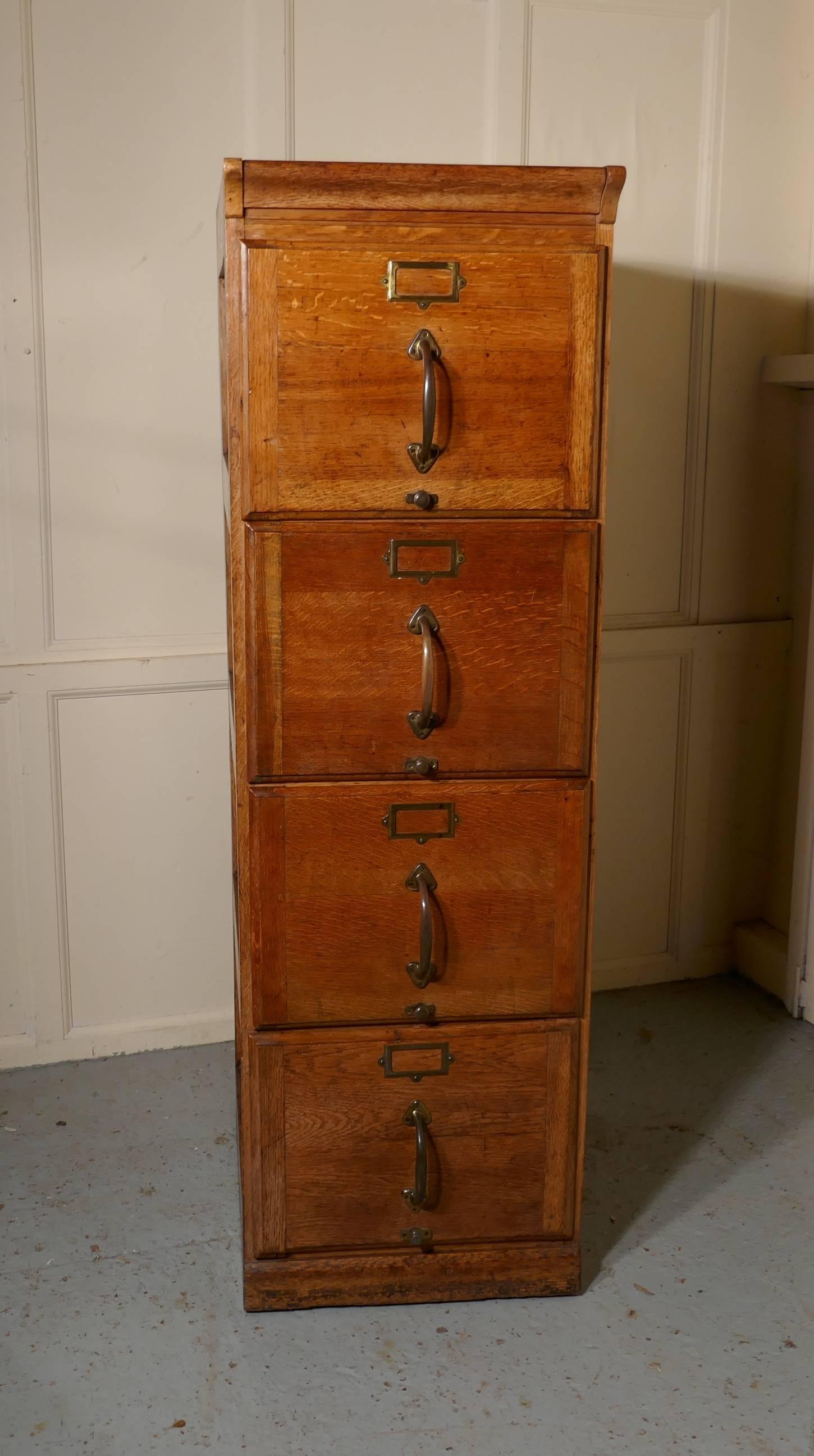 A Large Art Deco 4 Drawer Oak Filing Cabinet

This is an absolute must for every home office or study, the cabinet has 4 deep and roomy drawers, they all glide smoothly and have brass handles and card holders on the front ( they are 15” wide, 20”