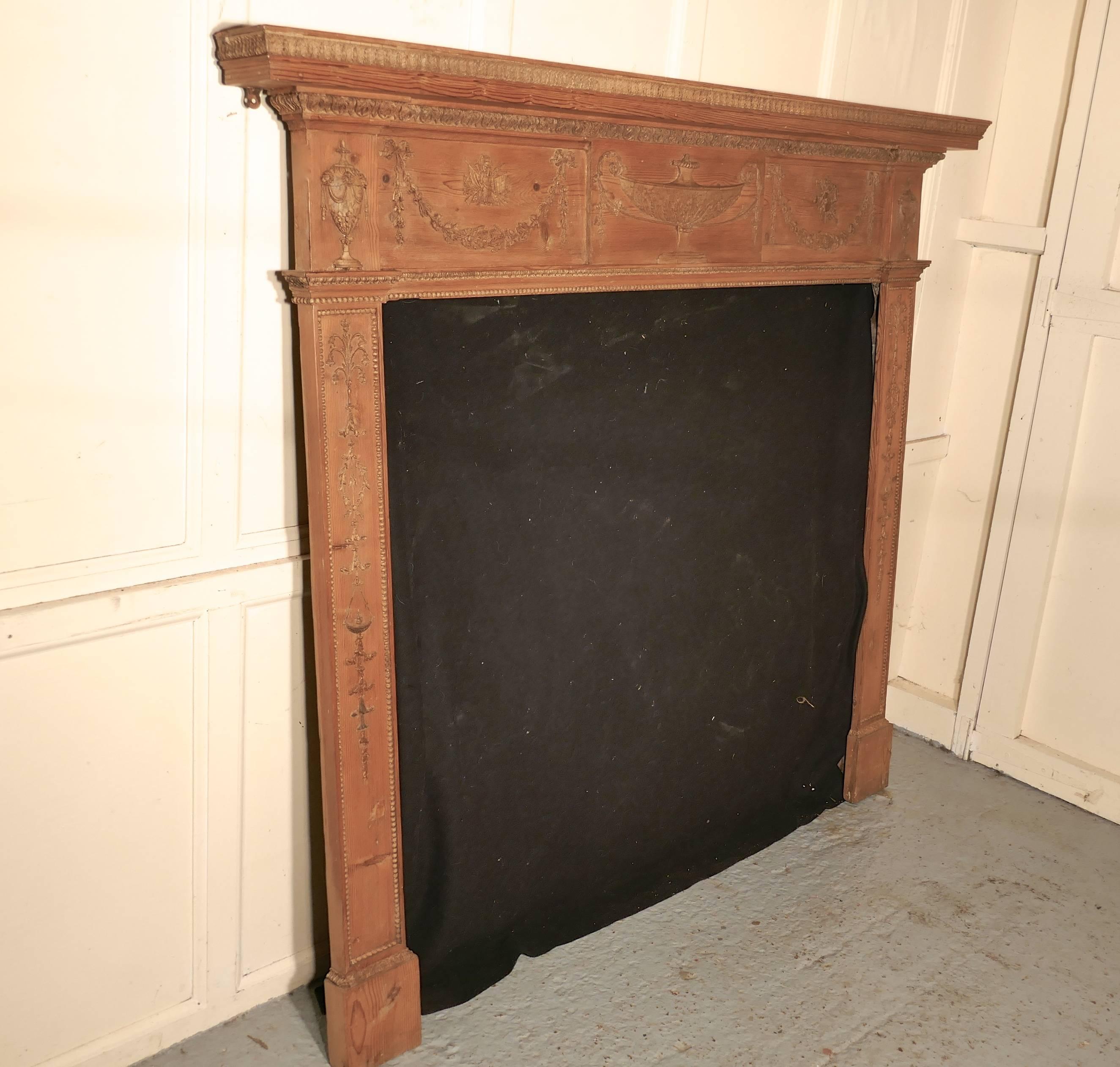 A Large 19th Century Adams Style Stripped Pine Fireplace.

The Fireplace has a large mantle piece and a large opening for the fire
The Fireplace has been reclaimed during house renovations, it is a Large Sitting Room Size and in all  round good