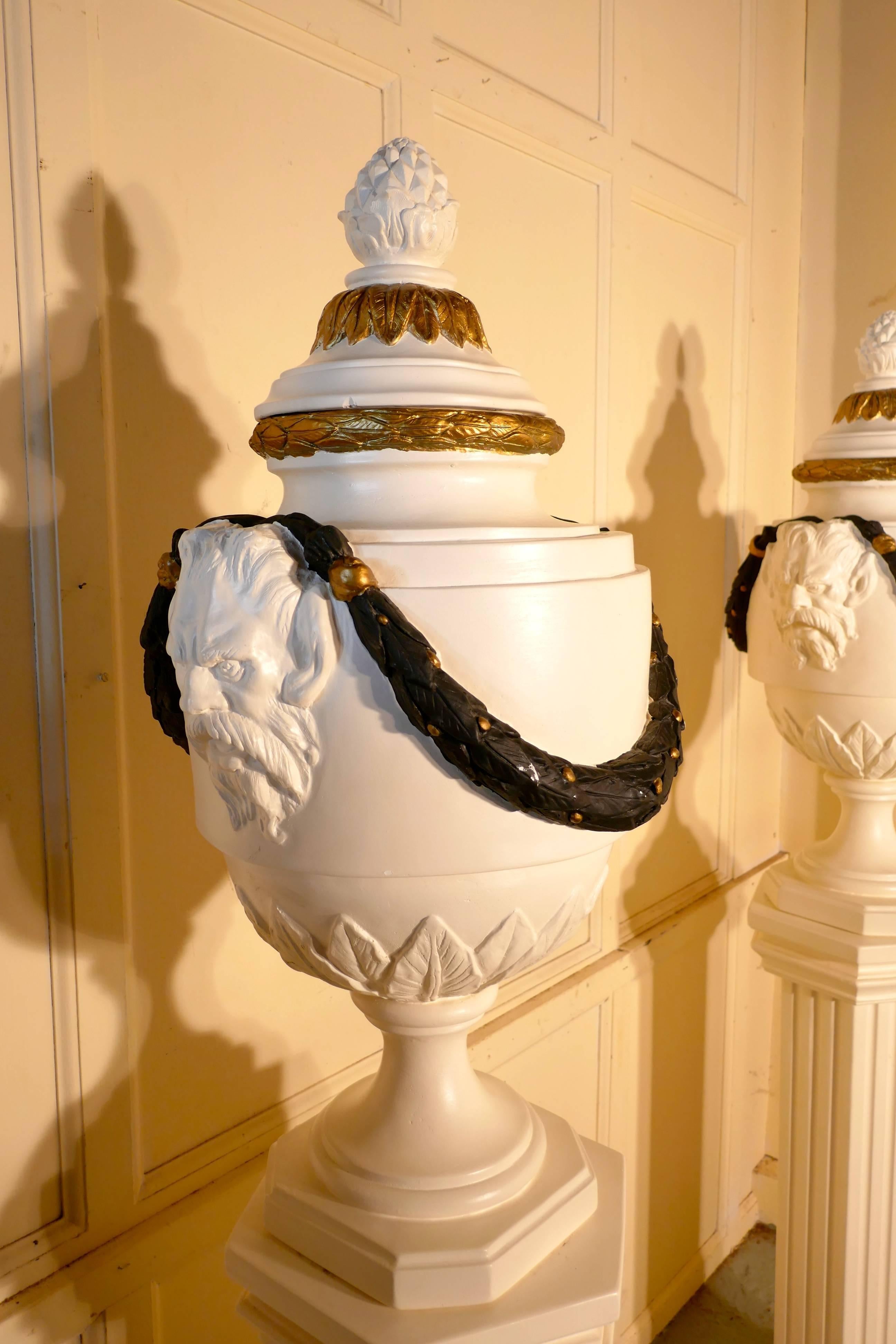 Classical Roman Pair of French Urns Set on Classical Column Pedestals For Sale