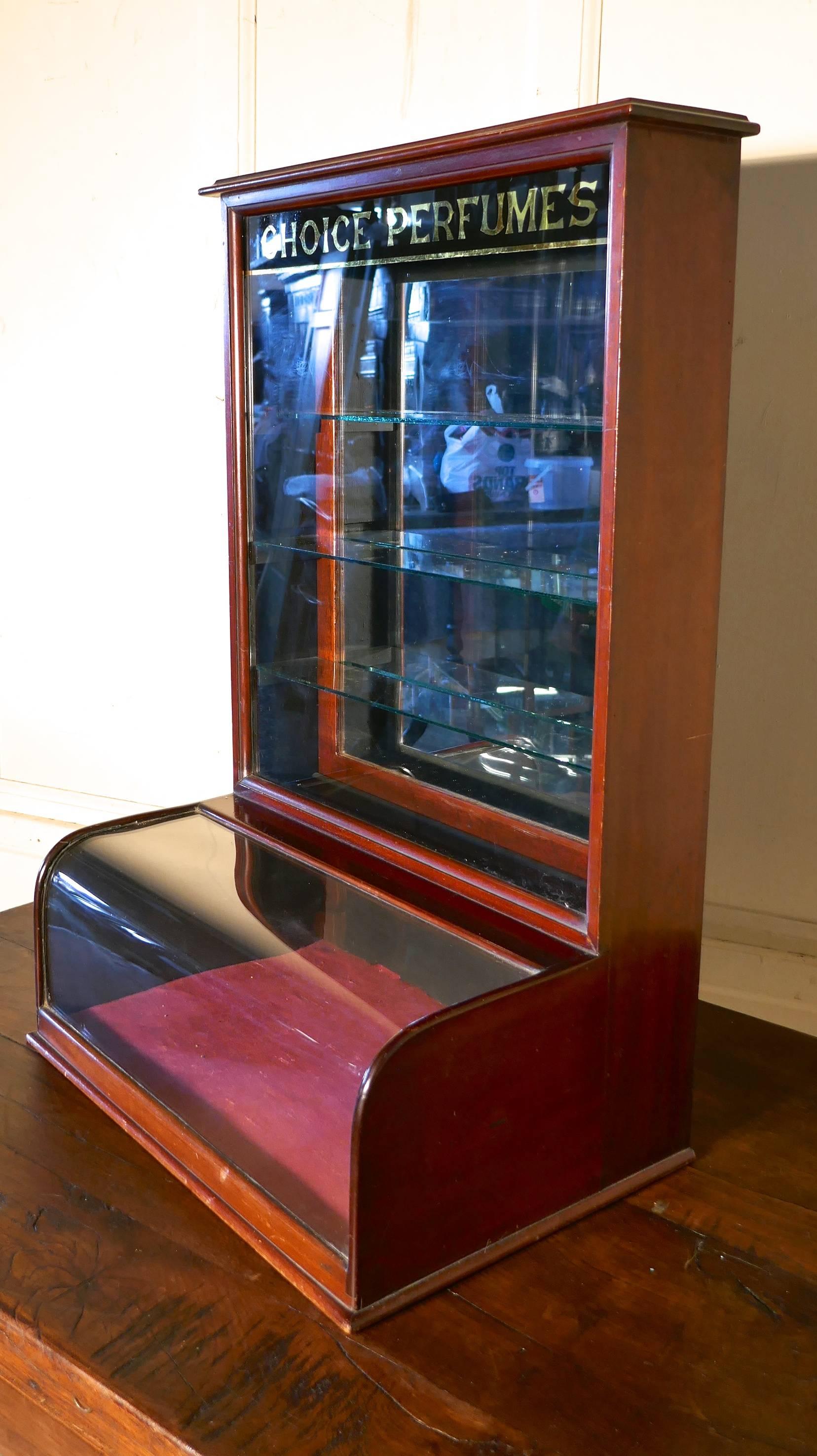 Victorian mahogany chemist’s perfume shop display cabinet

This charming Victorian mahogany shop display cabinet is made in plate glass and mahogany, the top of the cabinet is decorated with a lovely old fashioned black and gold mirrored sign,