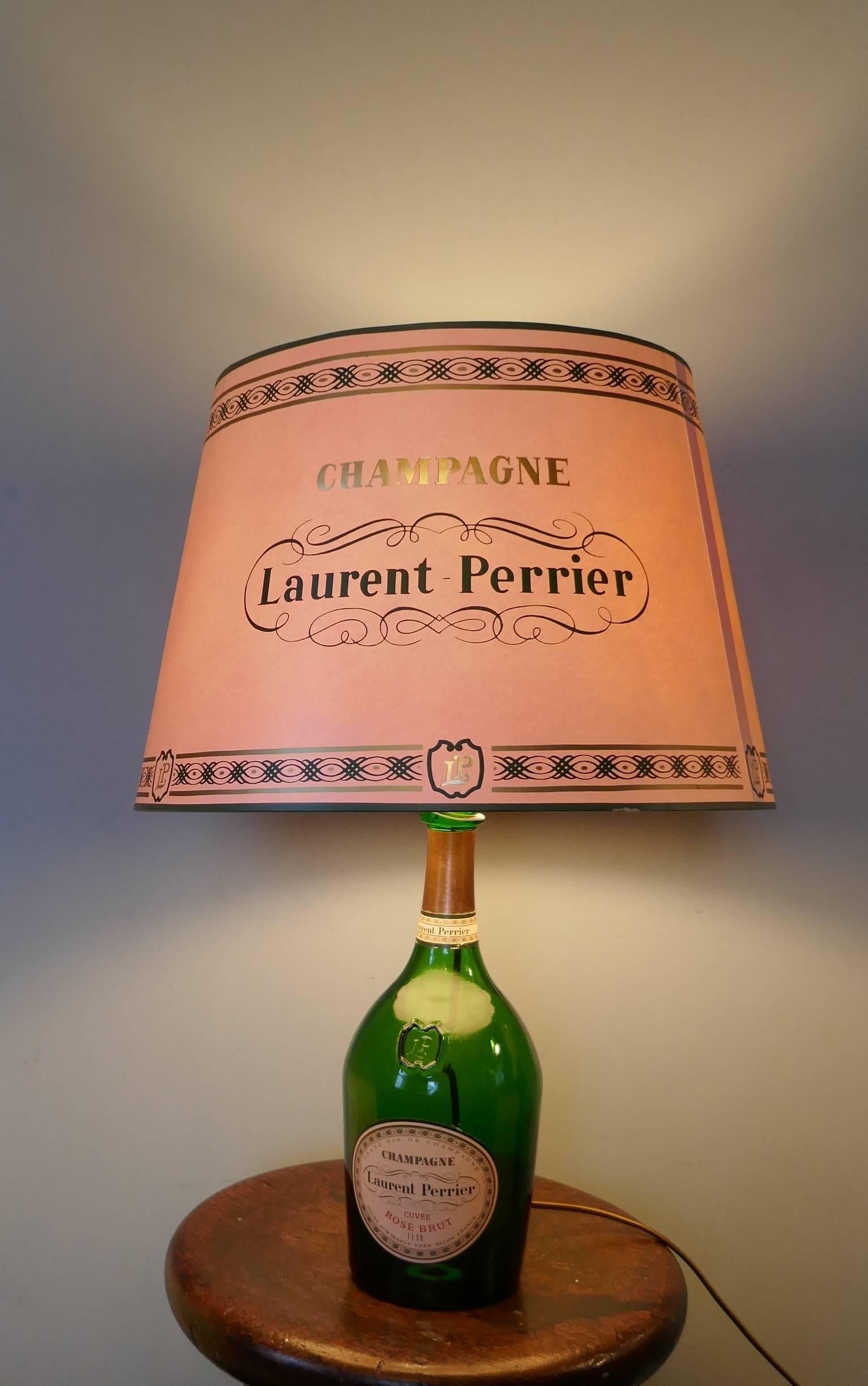 Laurent Perrier Champagne cuveé rose brut advertising table lamp


Fresh from France this superb lamp was part of a Chateau display, it is a genuine 1.5 later bottle and comes with its original matching parchment shade, in pale pink of course to