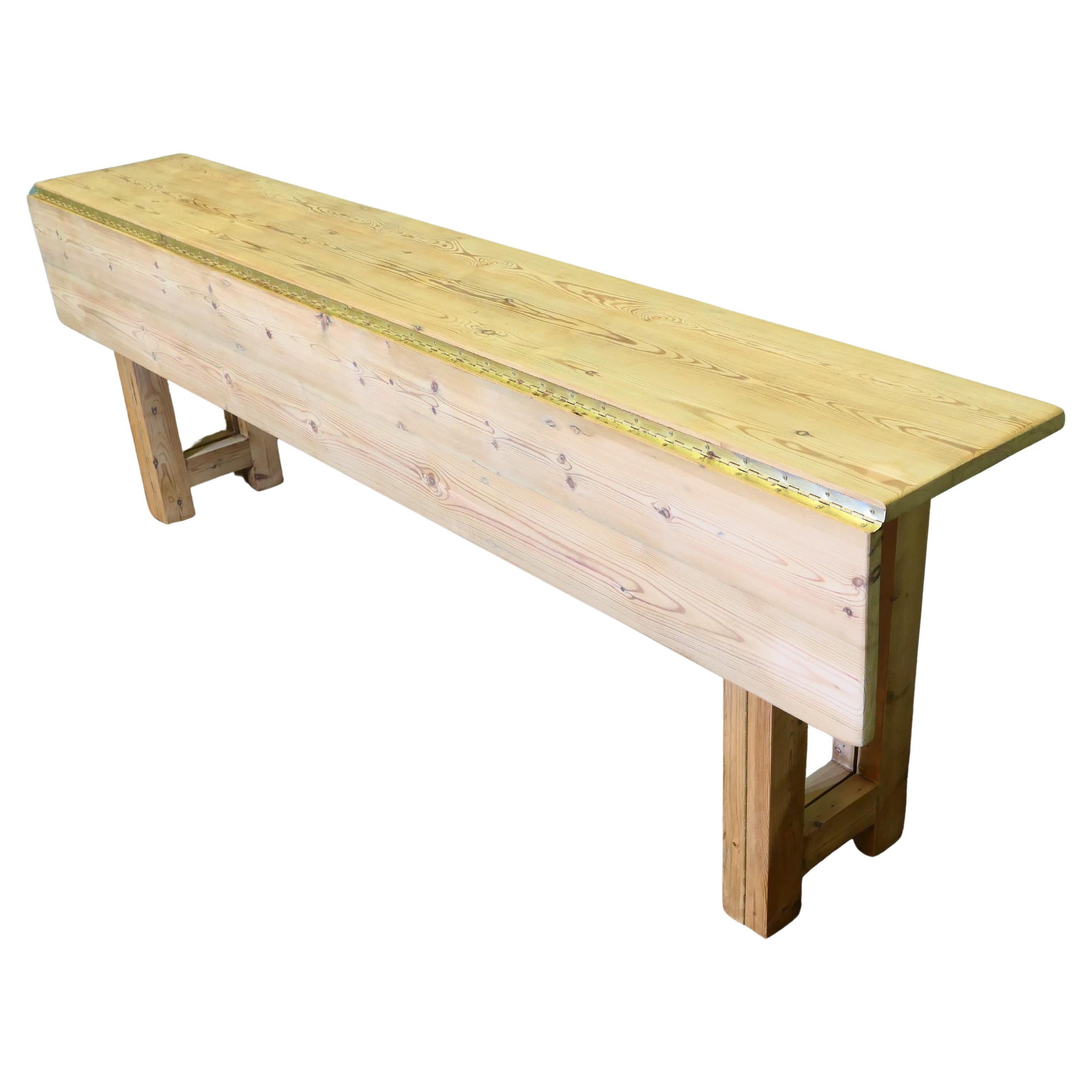 A Very Long Extending Pine Dining Table For Sale