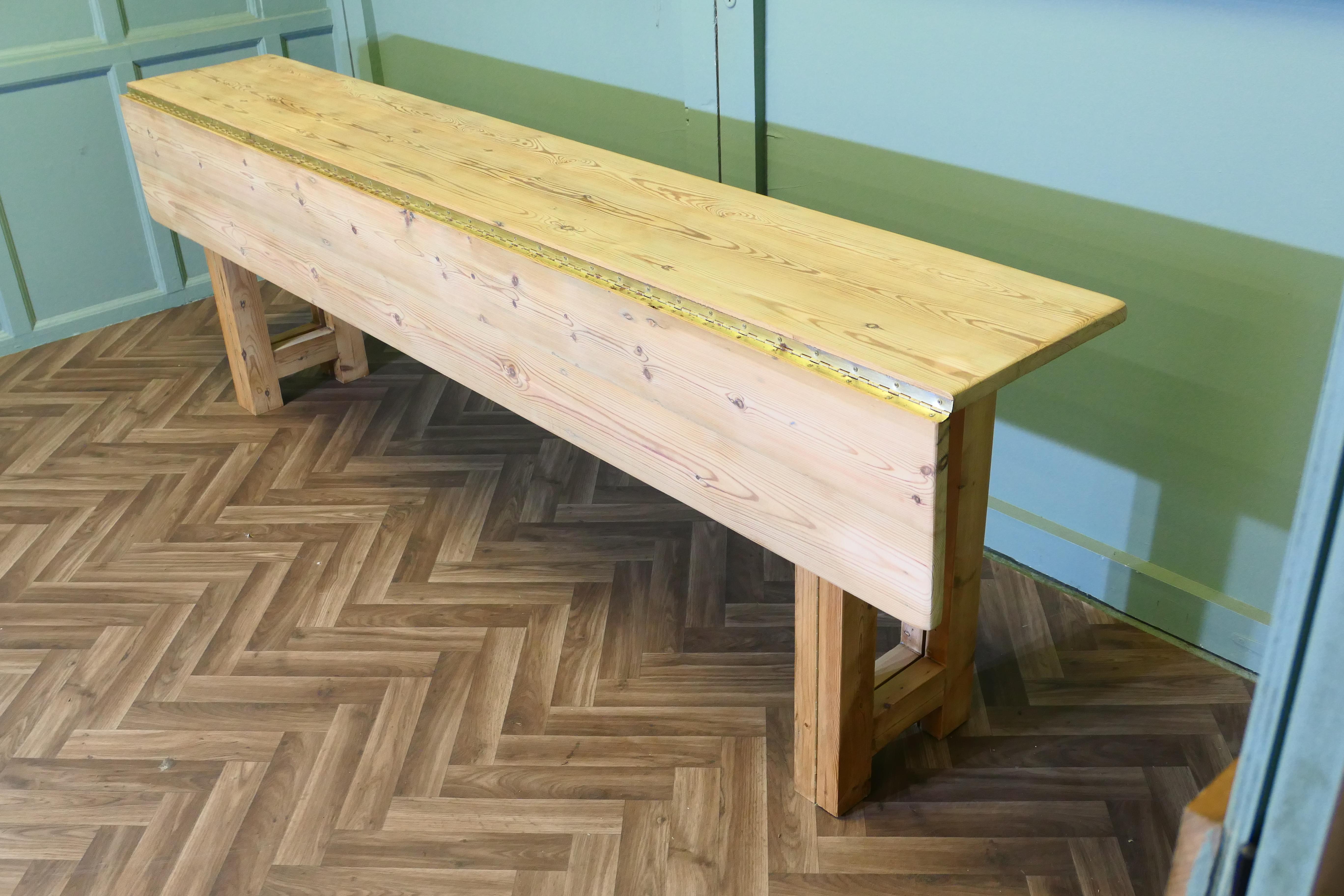A Very Long Extending Pine Dining Table
The narrowness of the table makes it very desirable when several diners need to be accommodated, the table top folds down easily and the size can be doubled just as easily This charming farmhouse table has a