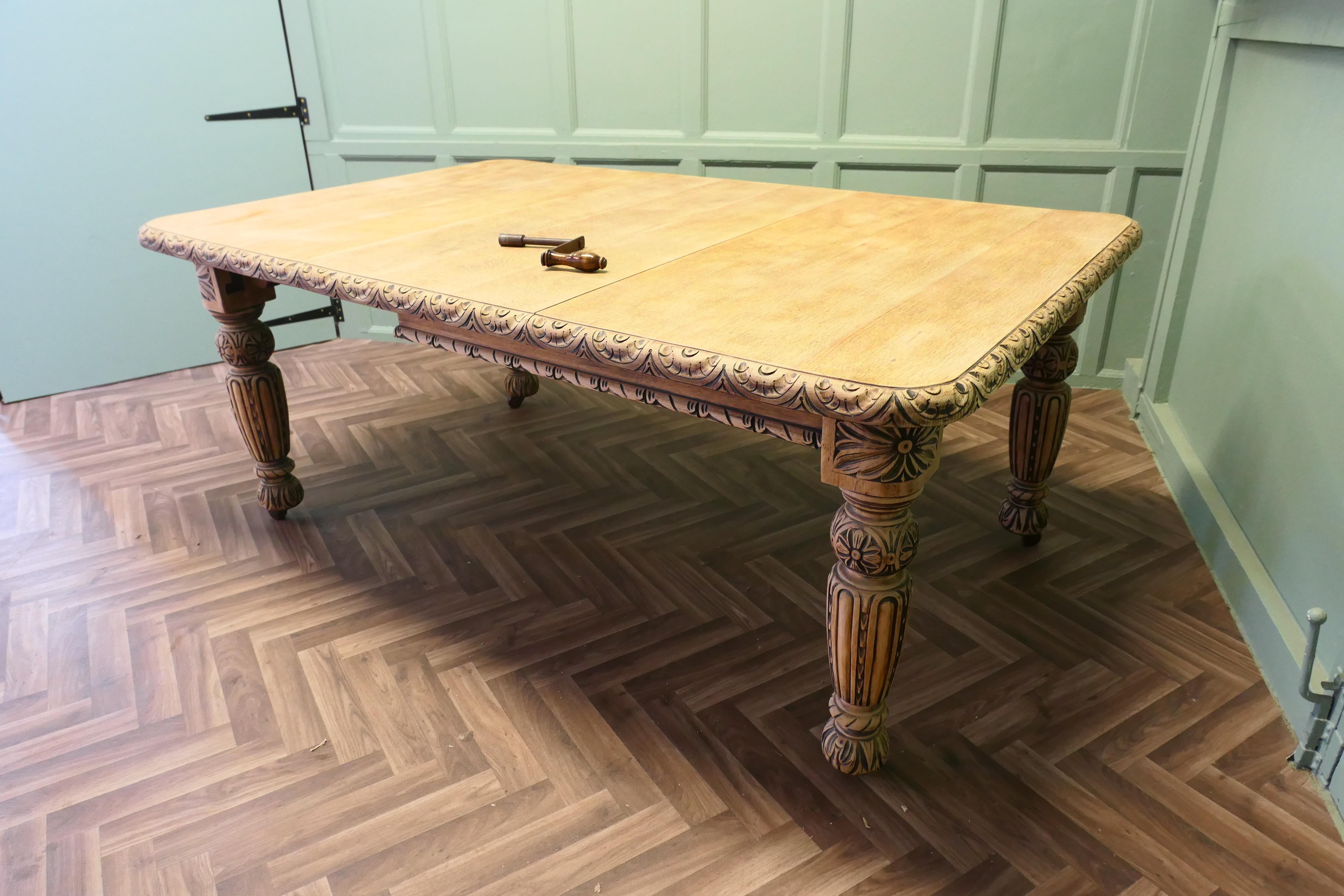 Bleached Oak Gothic Style Extending Dining Table
This is a very sturdy table both the top and the legs are solid Oak. The table extends by means of a winding mechanism that opens the table in the centre and the leaf can be inserted.
The table top is